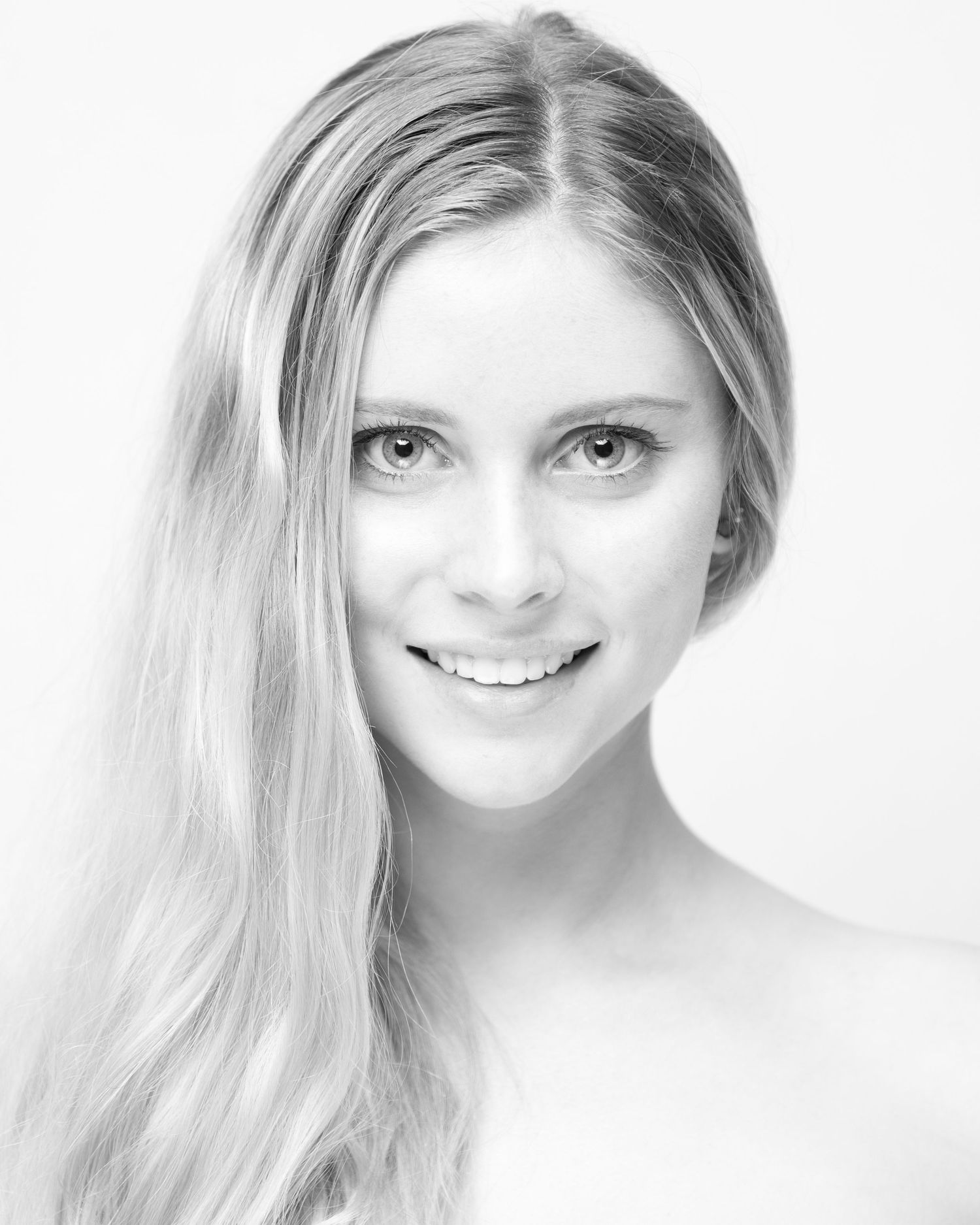 High key white portraits with soft lighting and natural expressions.