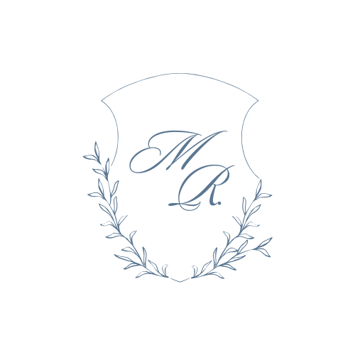 Hand drawn floral wreath with delicate blue branches and leaves forming a circular design on white background.