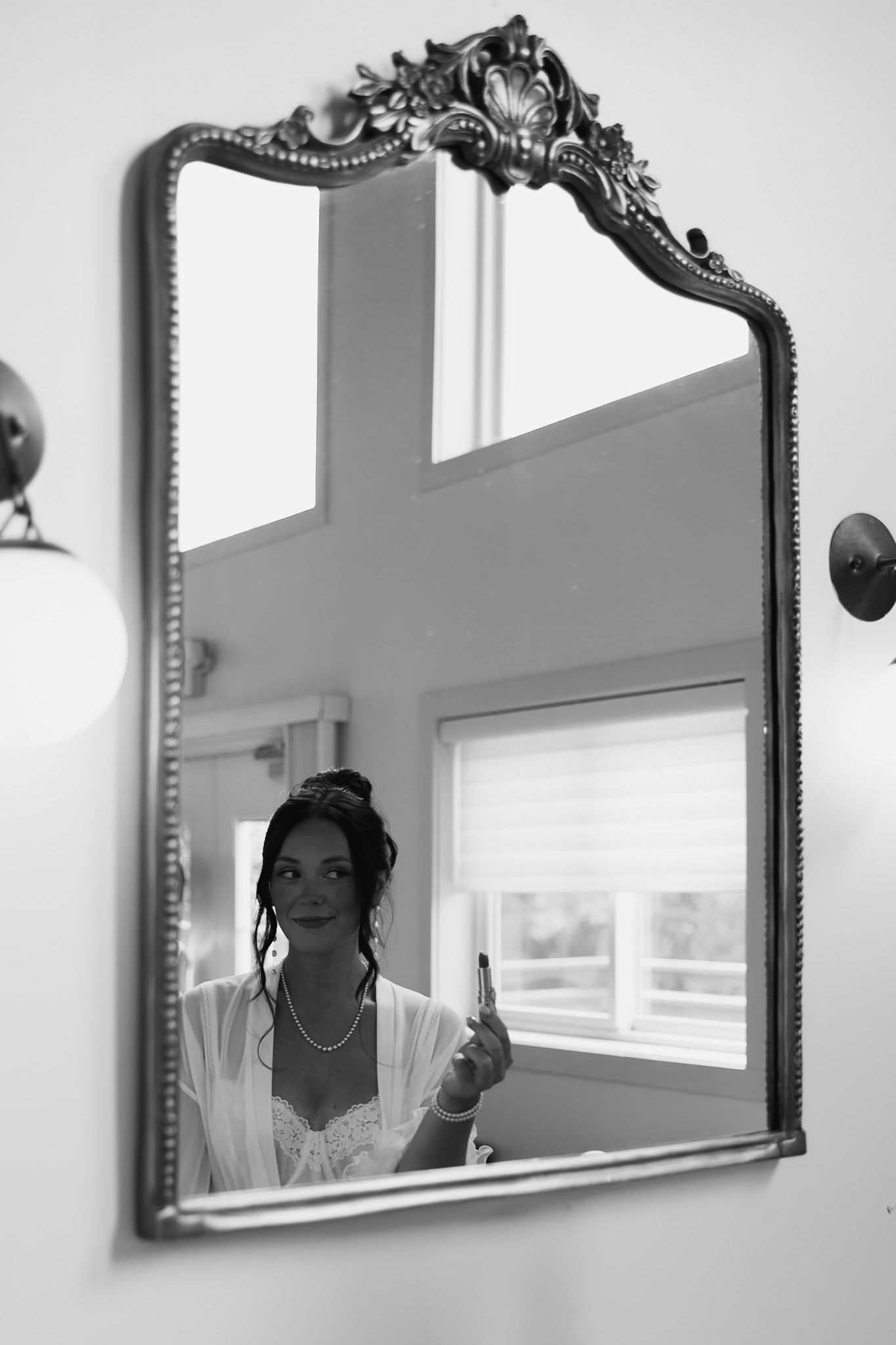 Reflections in an ornate mirror show preparation moments.