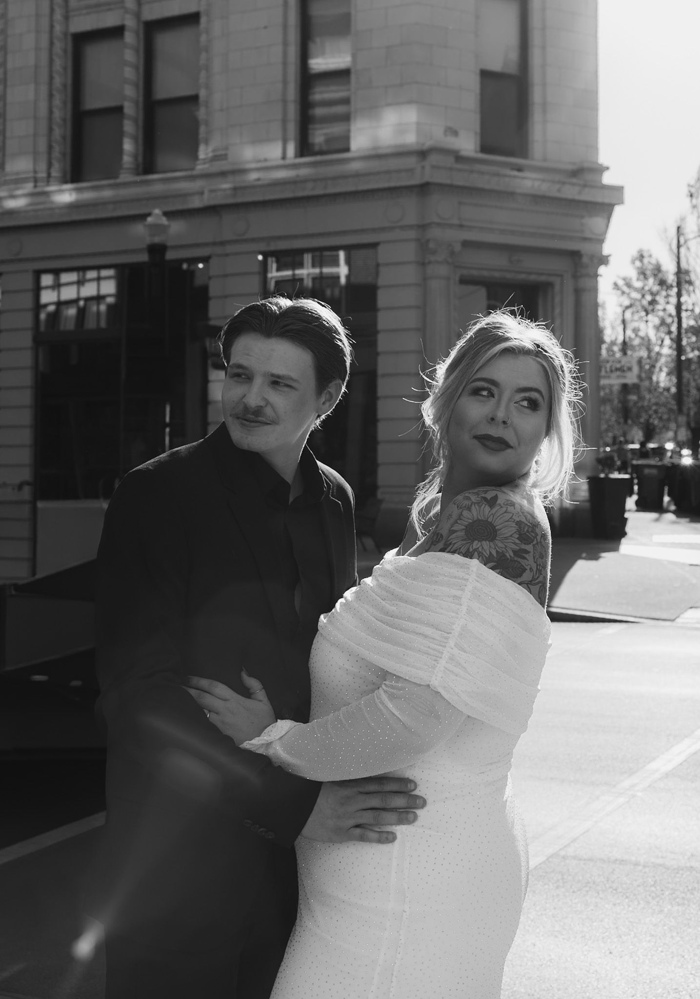 Black and white series showing tender moments between a couple on their wedding day.