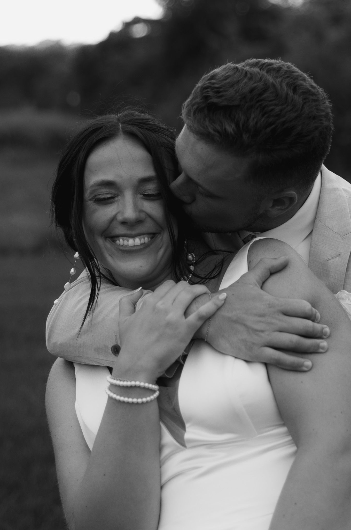 A romantic black and white sequence captures tender moments between a couple.