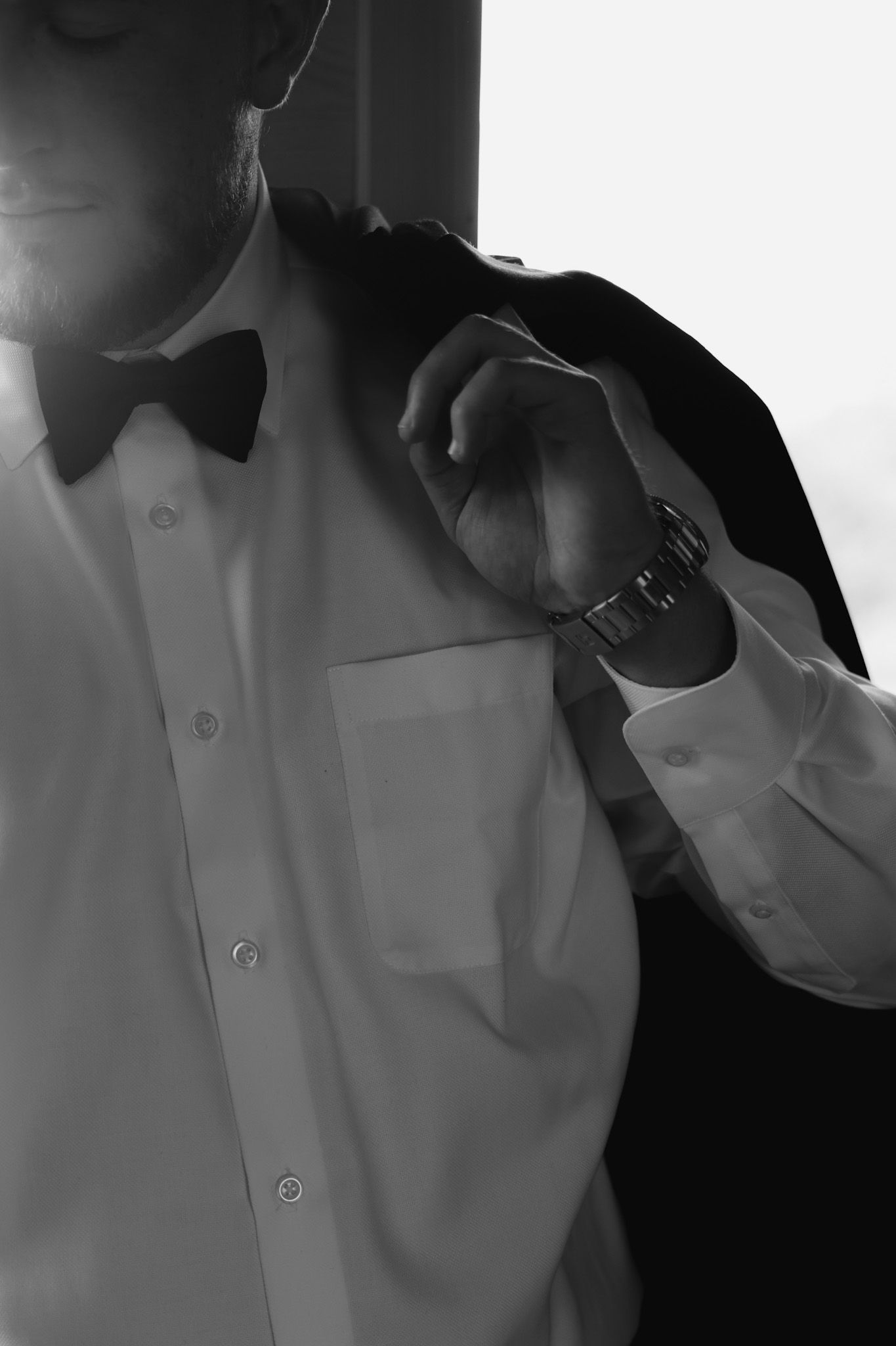 Black and white close-up shots showing formal attire and bow tie details.