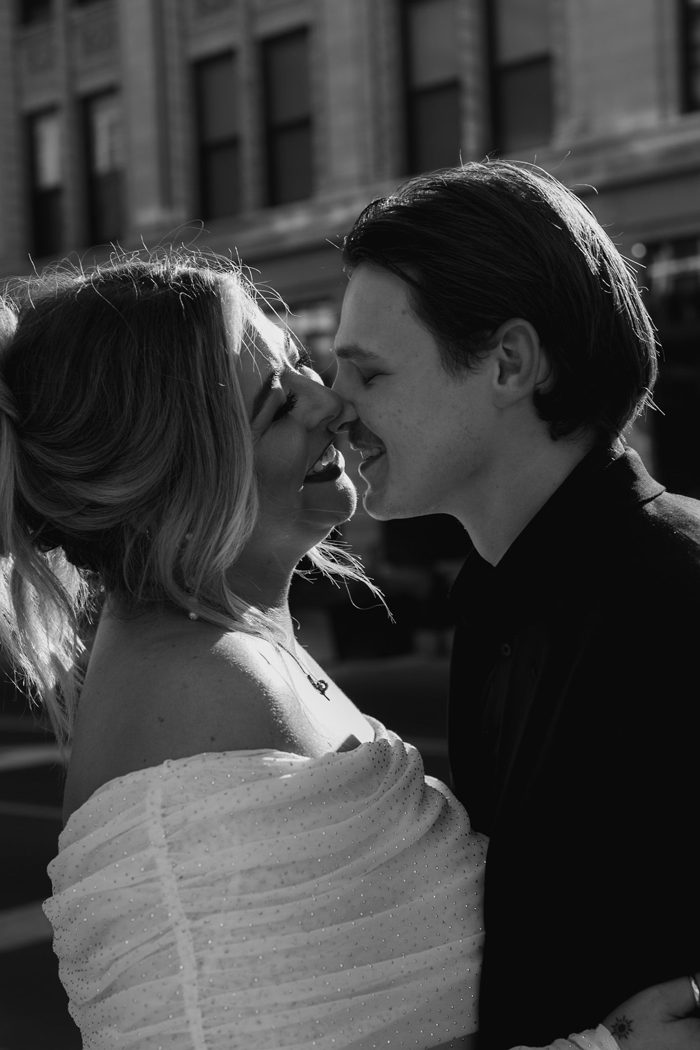 Intimate black and white sequence of a romantic moment between newlyweds.