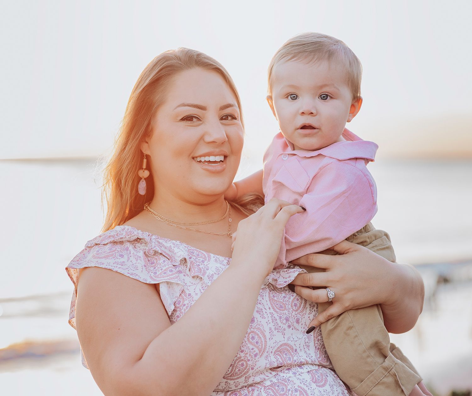 Mother & baby in soft lighting on the beach for family photos in Jacksonville, Florida