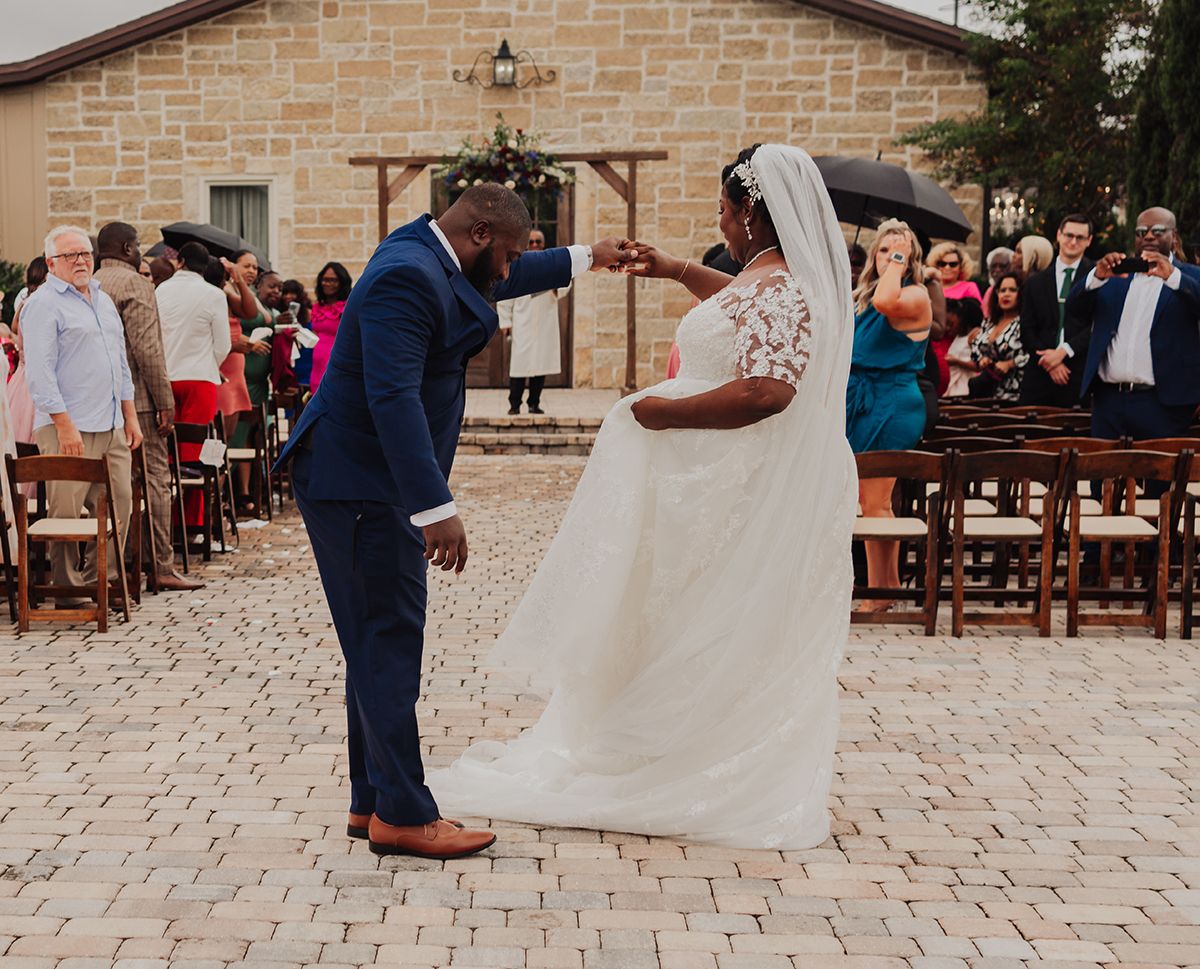 A sequence of wedding photos showing the couple dancing together on a stone patio outside a brick venue.