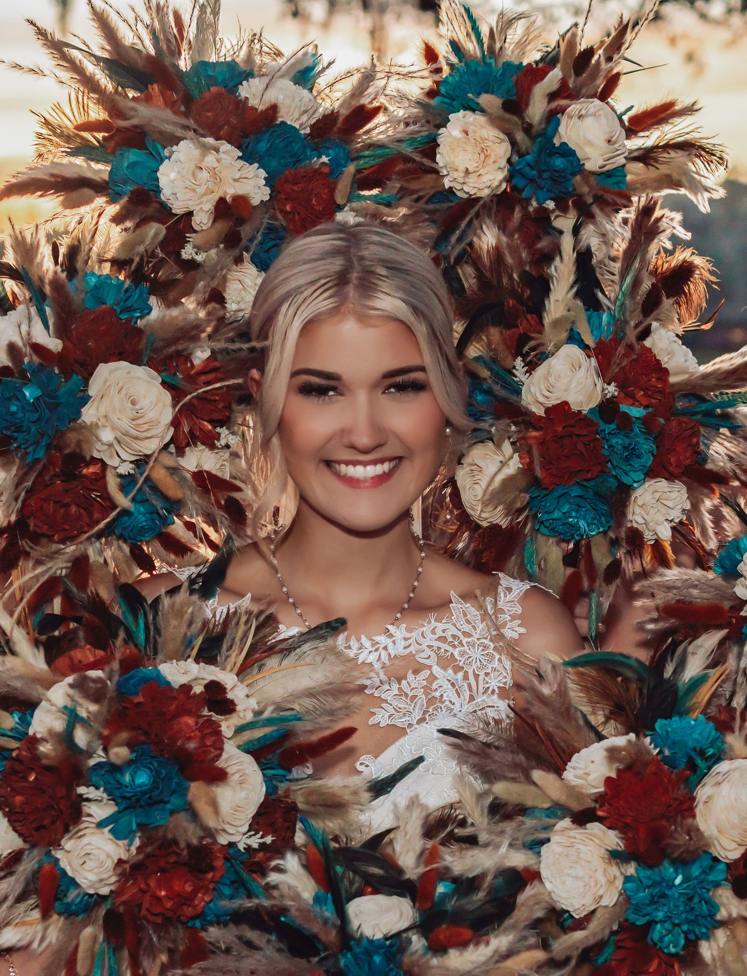 Bridal portrait collage featuring burgundy, turquoise and white floral arrangements with feather accents.