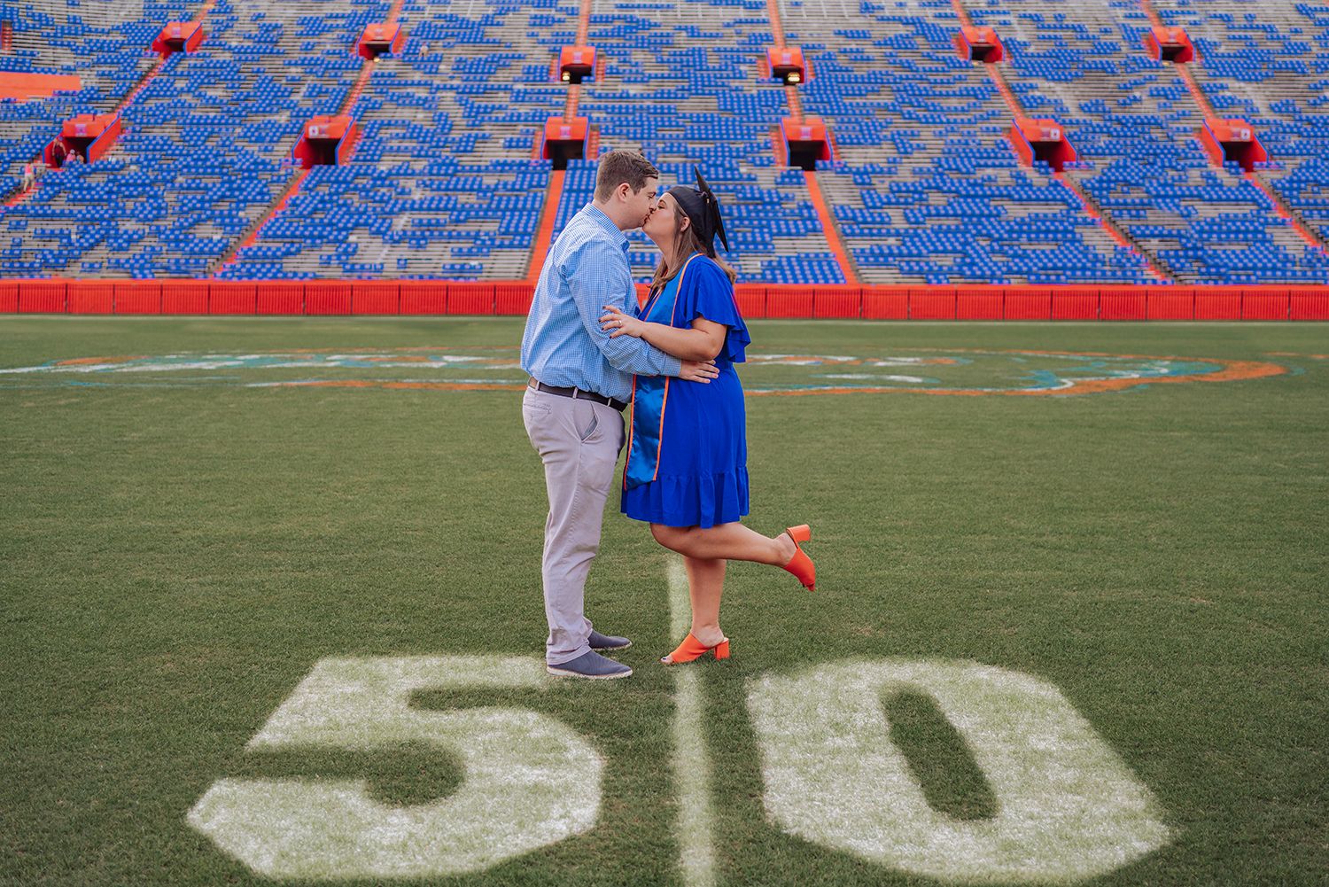 Graduation photoshoot of graduate of University of Florida in Gainesville, Florida on the 50 yard line.