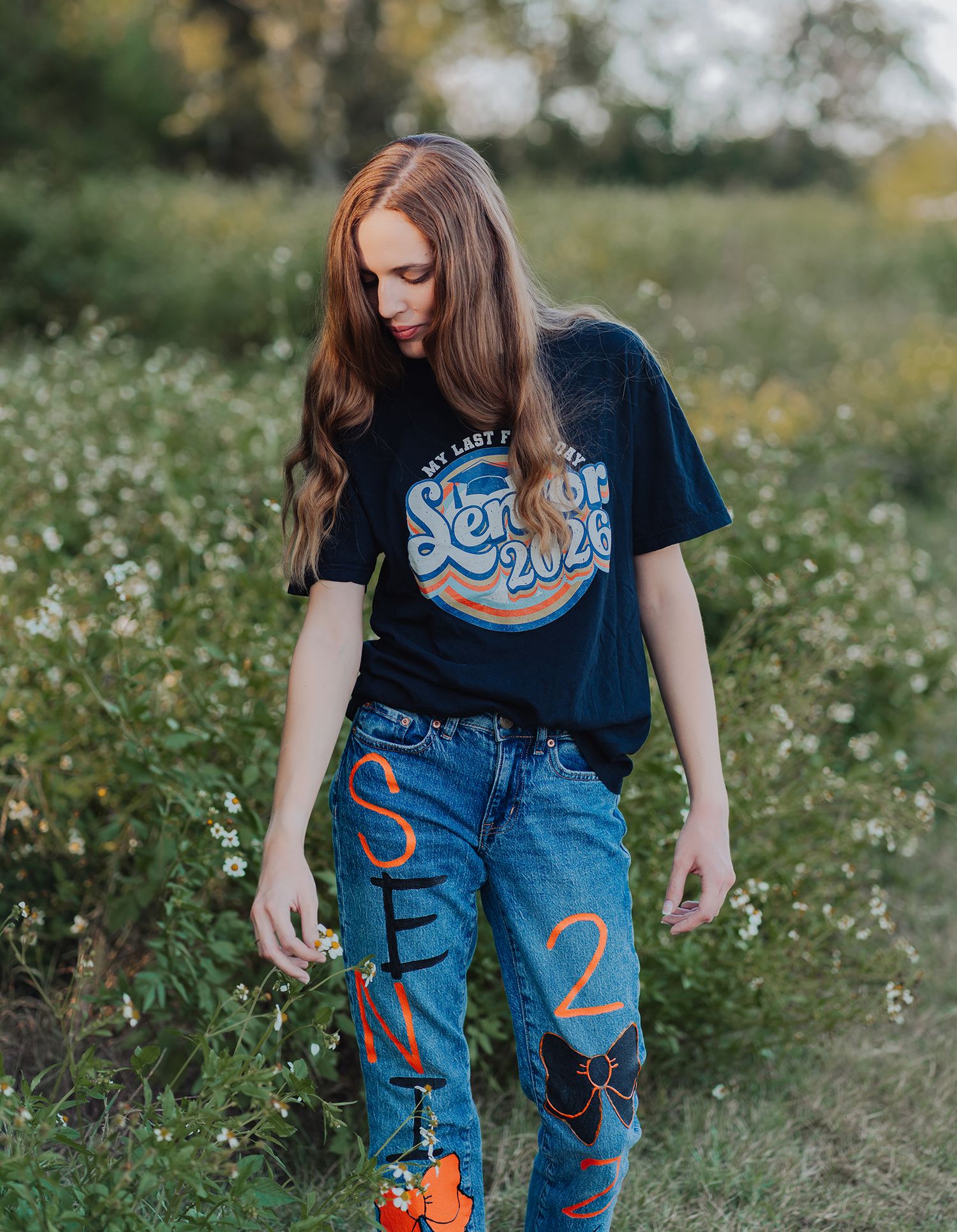 High school senior poses in wildflower field in Newberry, Florida