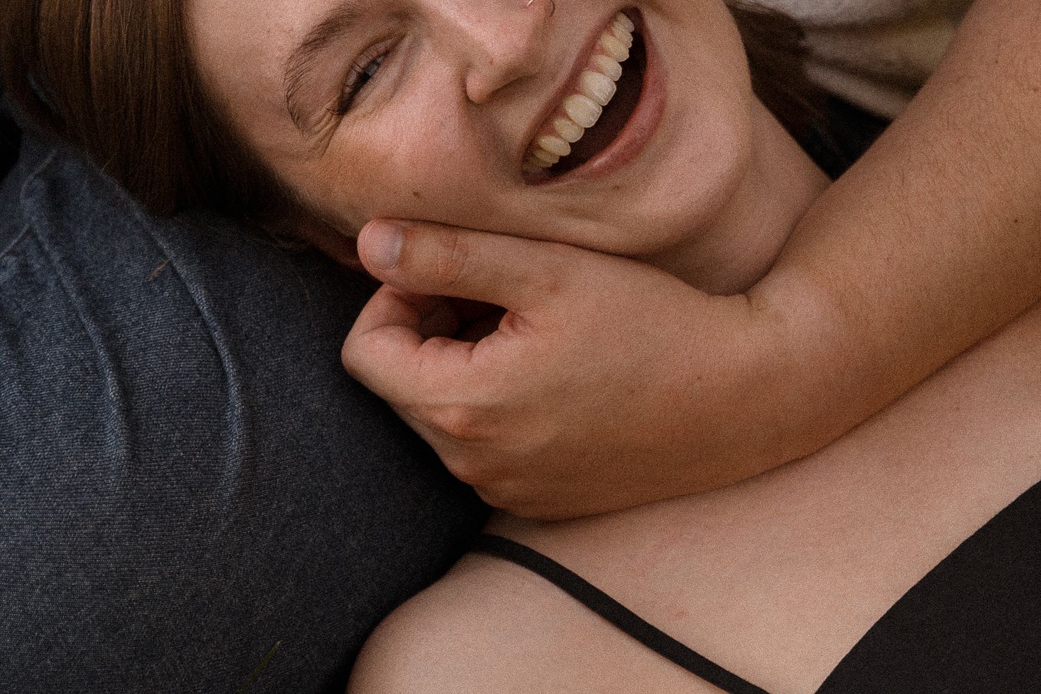 Close-up photography capturing joyful expressions and tender moments.