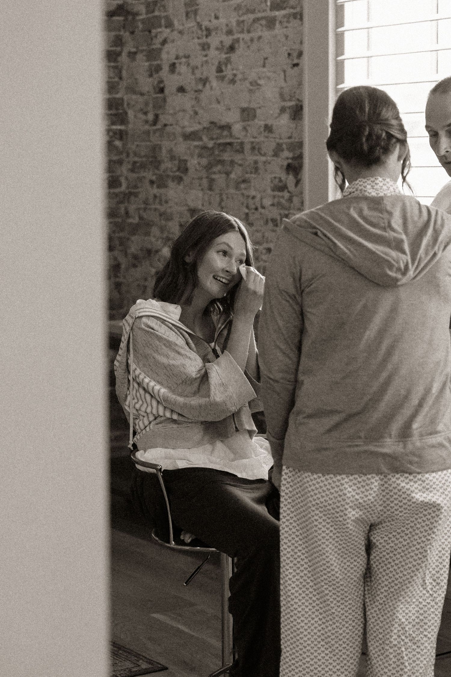 Intimate black and white photo of couple sharing a quiet moment together.