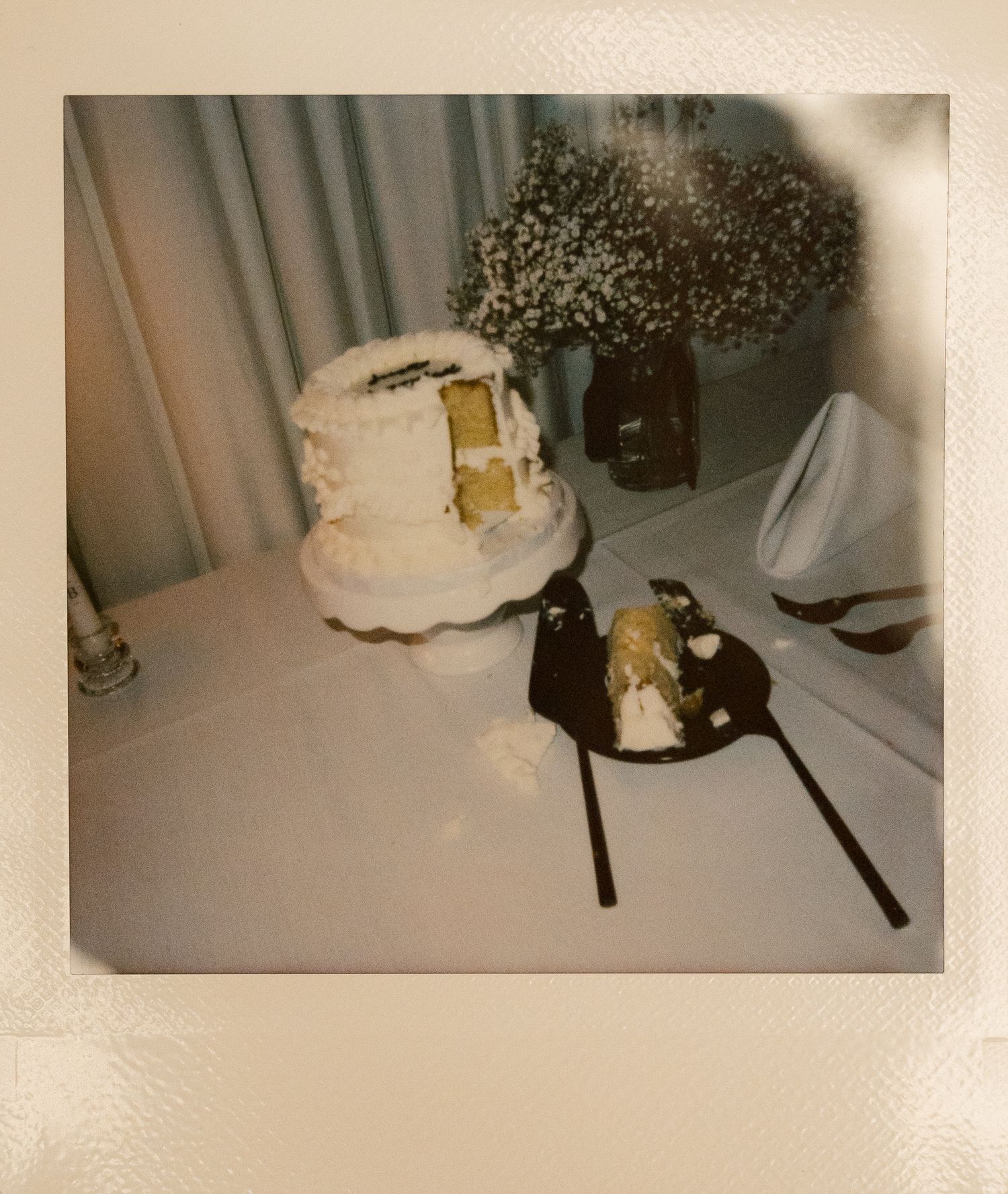 Vintage-style polaroid photos showing wedding cake and decorations.