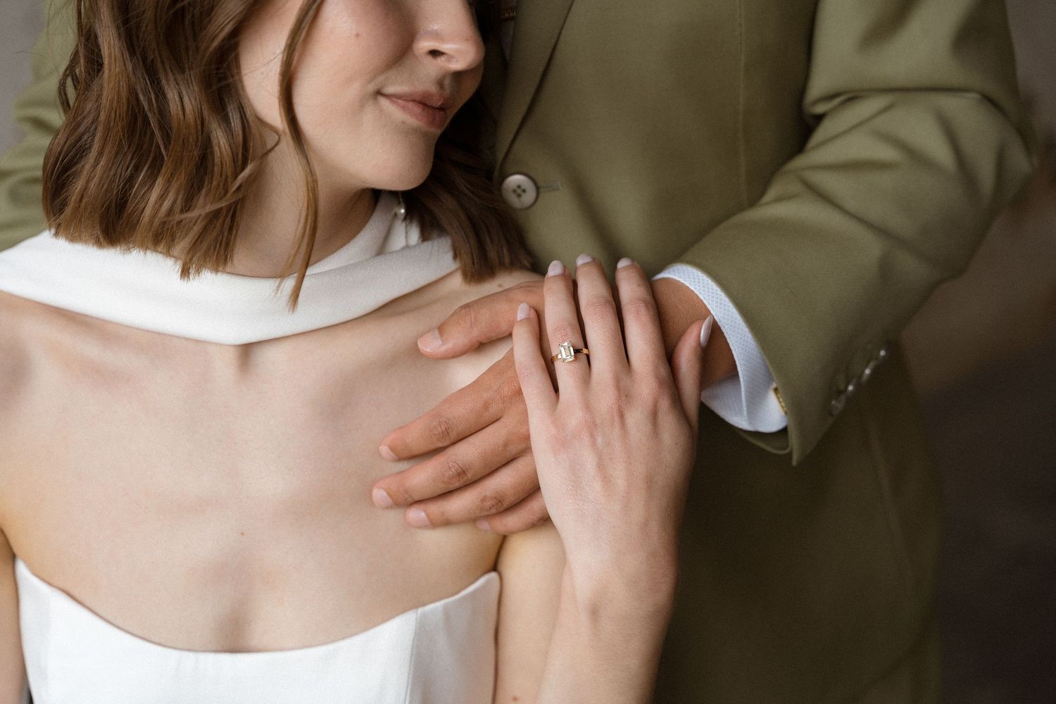 Close-up shot of couple's tender moment during their wedding day.