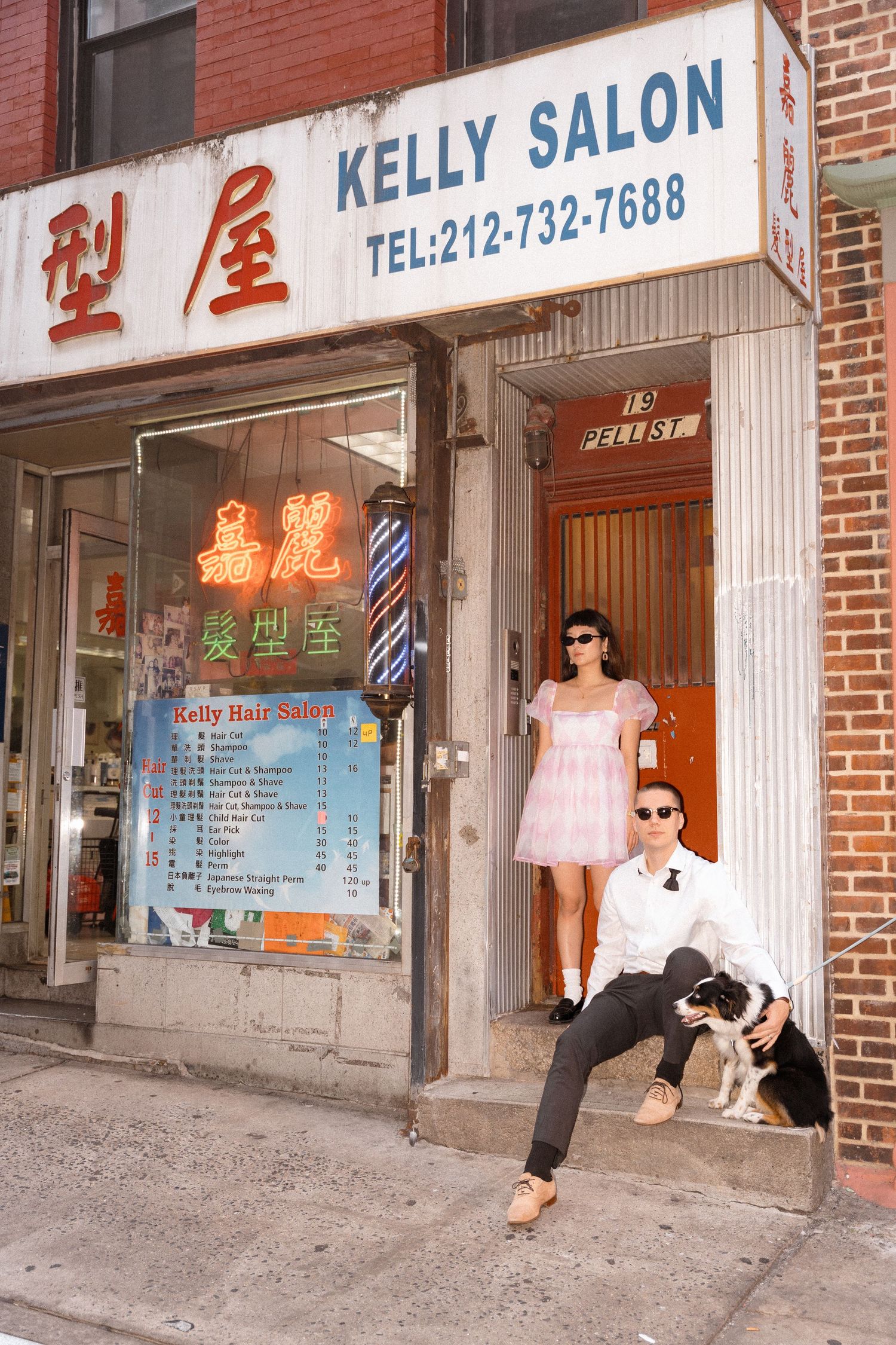 A street scene outside a salon with vintage storefronts and Chinese signage.