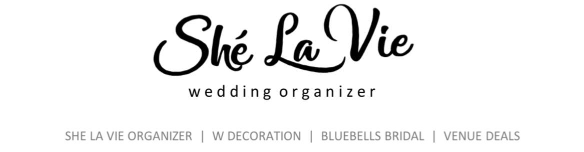 Shé La Vie wedding organizer logo with navigation links for decoration, bridal, and venue deals.