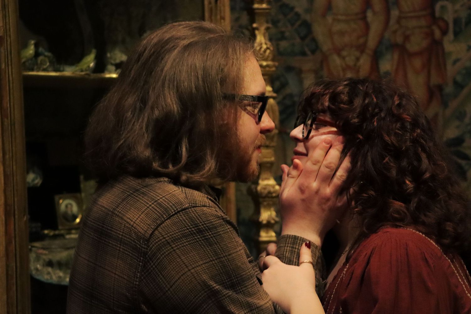 A couple shares an intimate and romantic moment together.