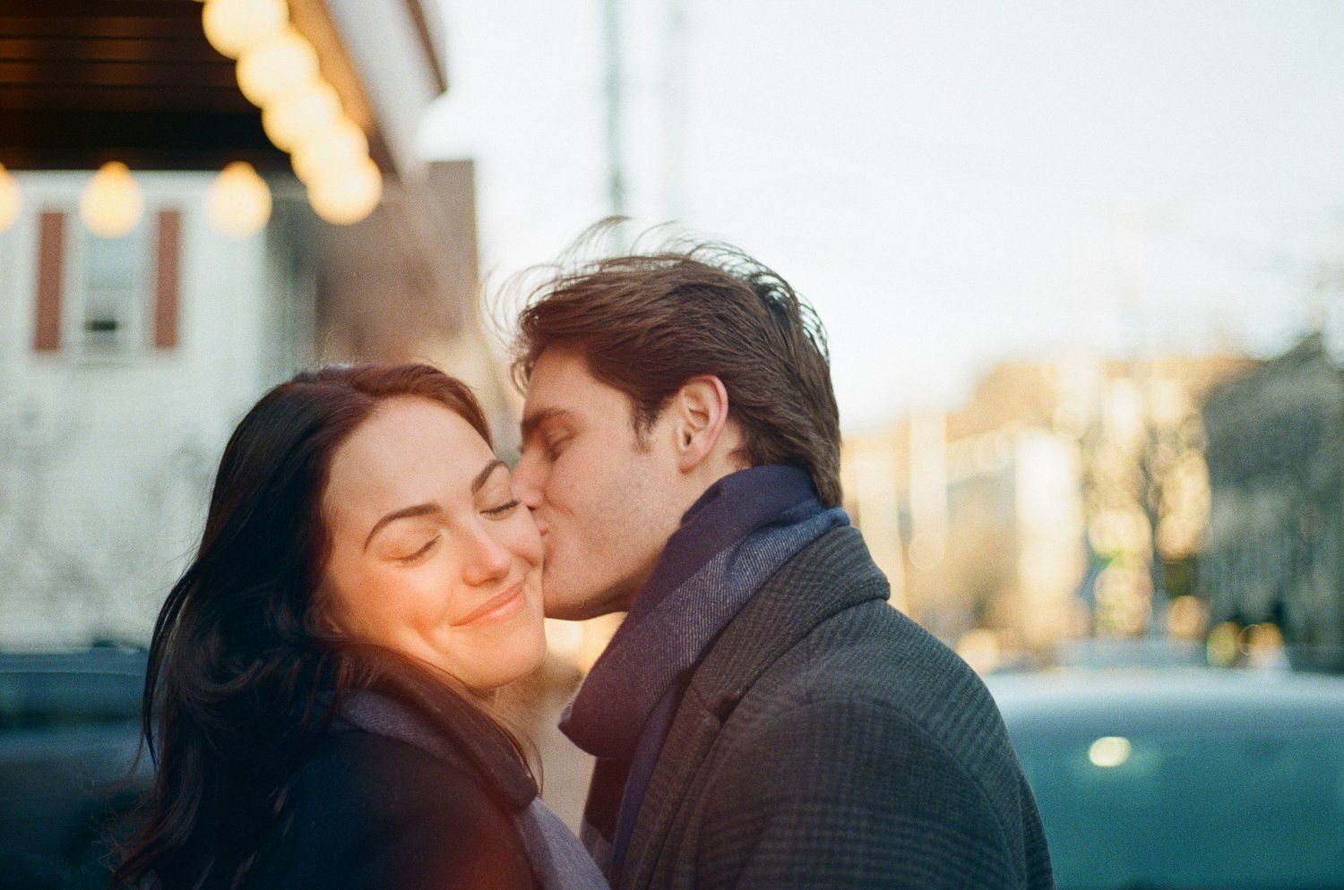 A romantic couple sharing intimate moments in a series of outdoor photos during golden hour.