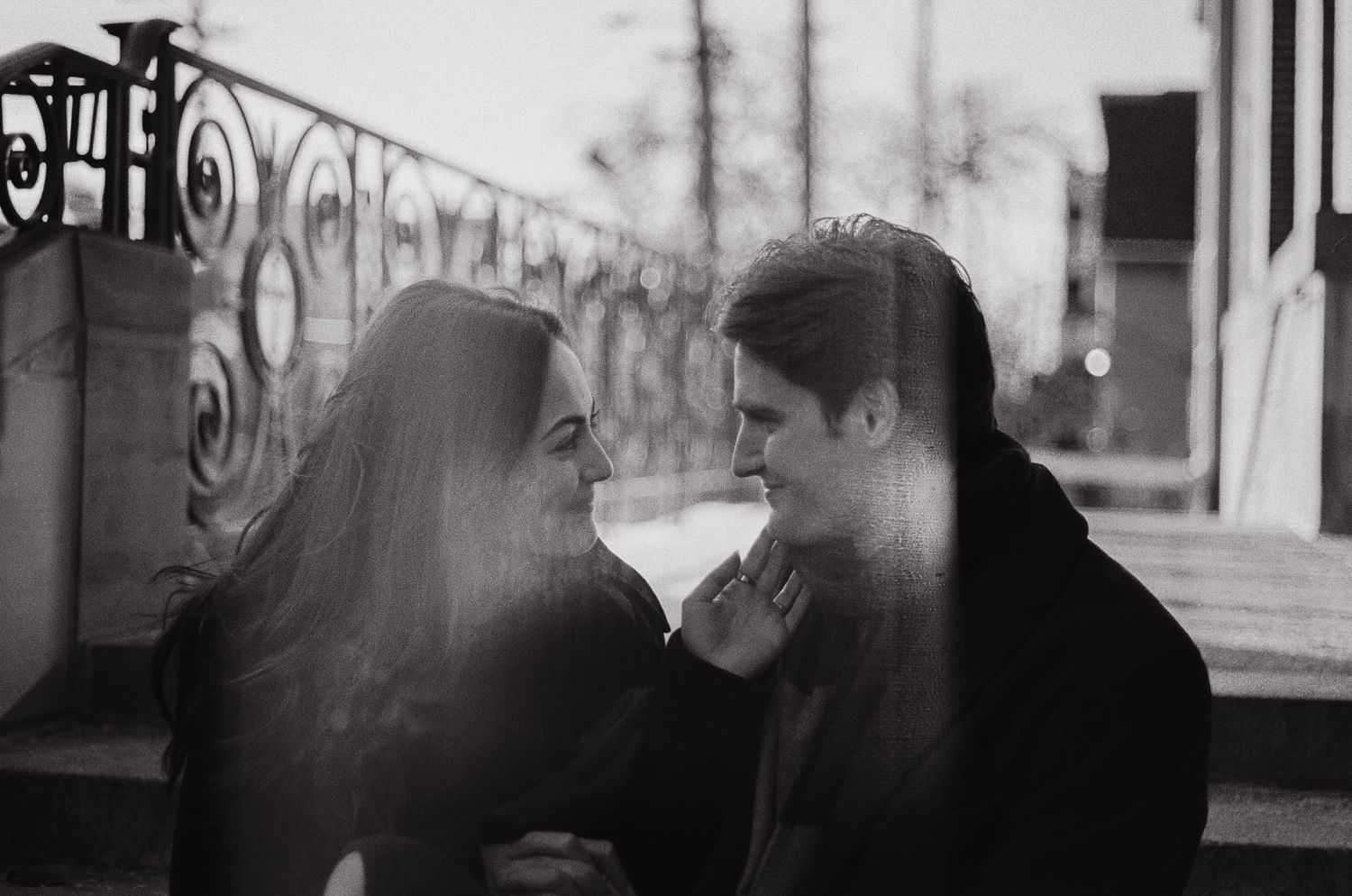 A series of black and white photographs showing people in various candid moments at a cafe or restaurant.