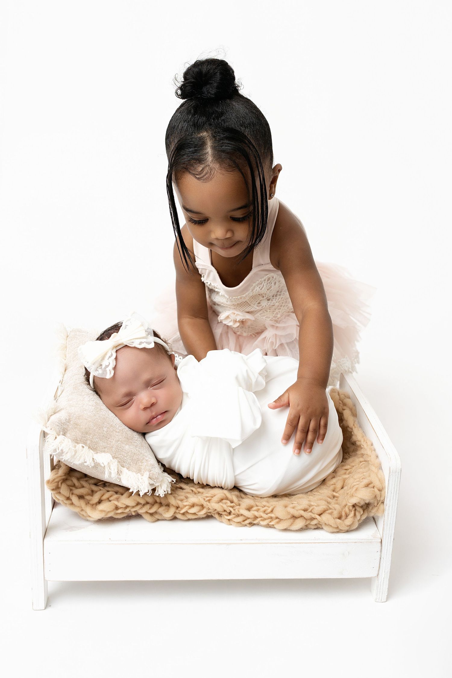 toddler and newborn. Captured by a sought-after professional newborn photographer in Woodland Hills, Los Angeles.