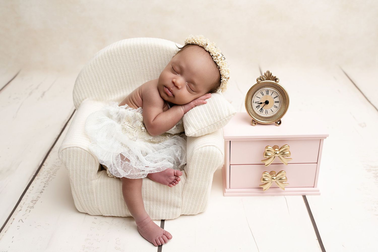 newborn sleeping in couch prop. Captured by a sought-after professional newborn photographer in Woodland Hills, Los Angeles.