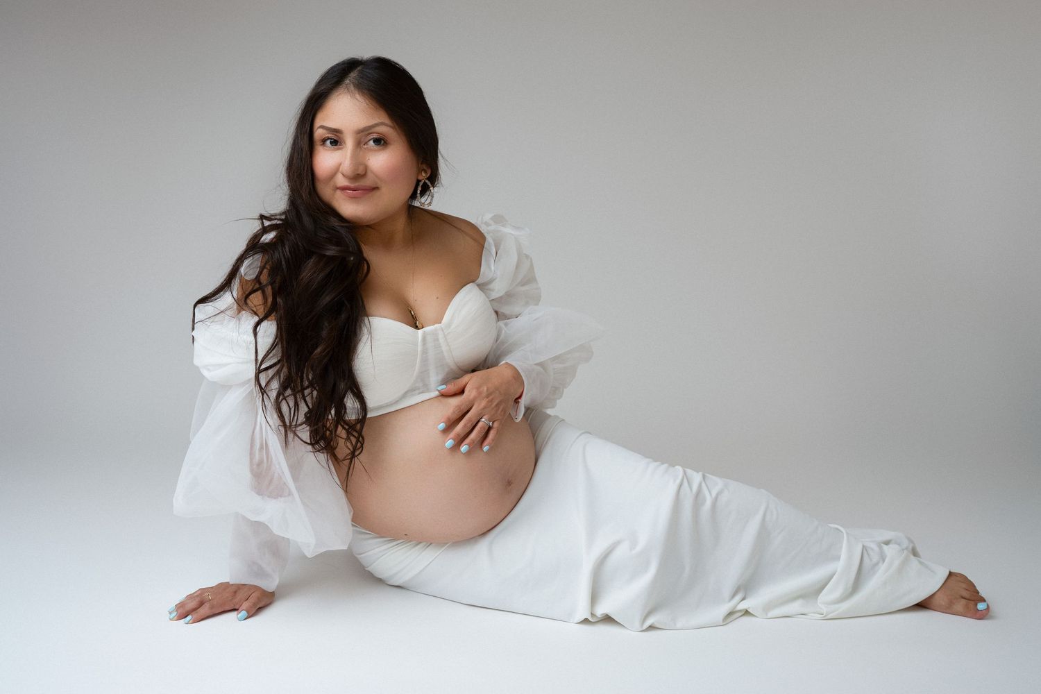 Pregnant mom in gown at our Woodland Hills studio. The best maternity photographer in Los Angeles.