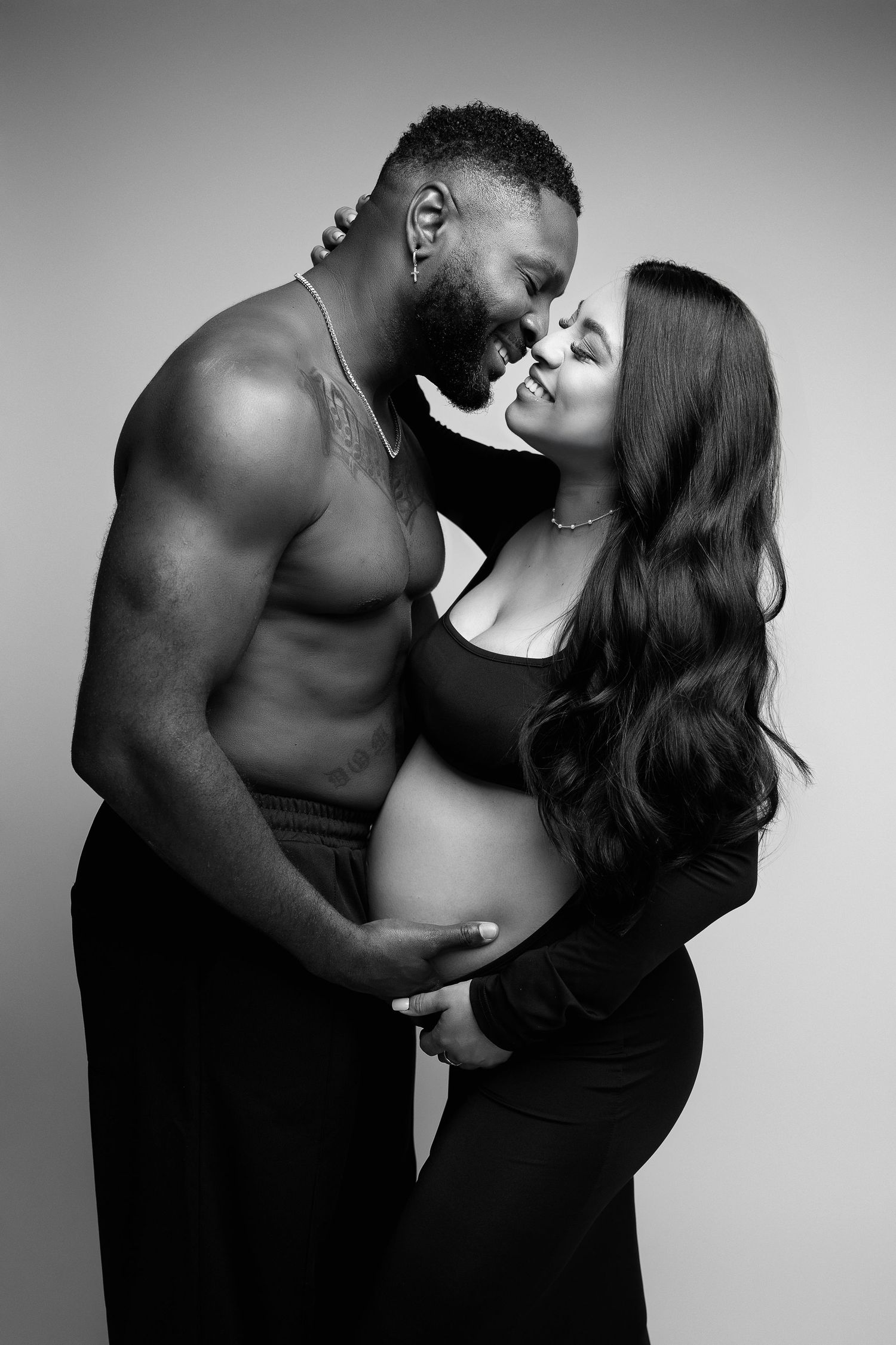 Pregnant mom and partner at our Woodland Hills studio. The best maternity photographer in Los Angeles.