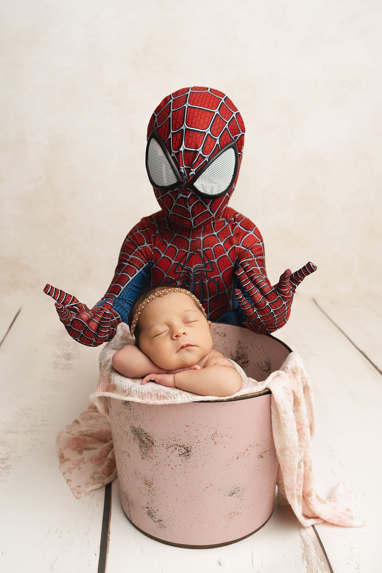 spider-man and newborn. Captured by a sought-after professional newborn photographer in Woodland Hills, Los Angeles.