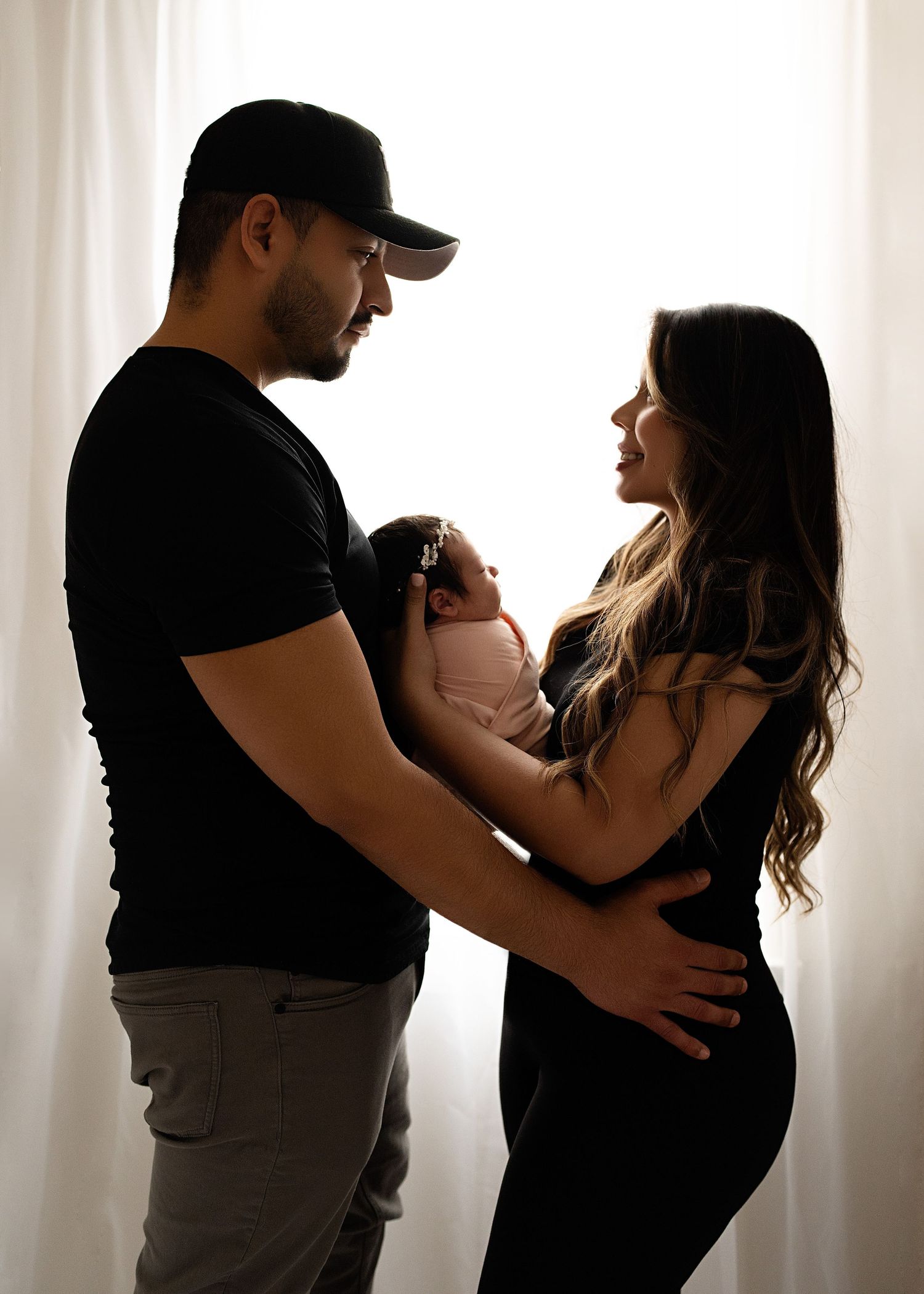 parents and newborn. Captured by a sought-after professional newborn photographer in Woodland Hills, Los Angeles.