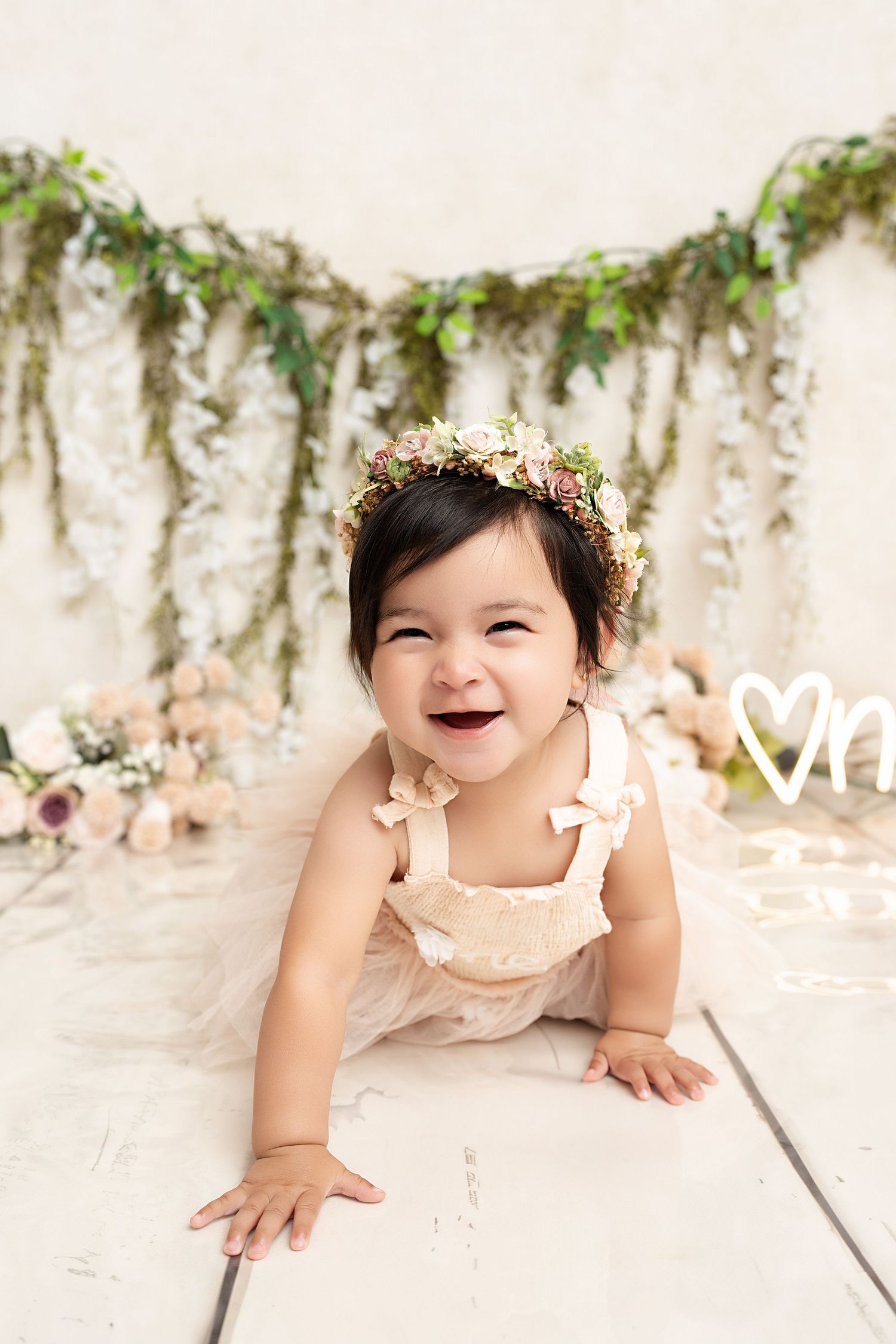 smiling baby crawling in our Woodland Hills studio. Amazing milestone photography in Los Angeles & the SF Valley.