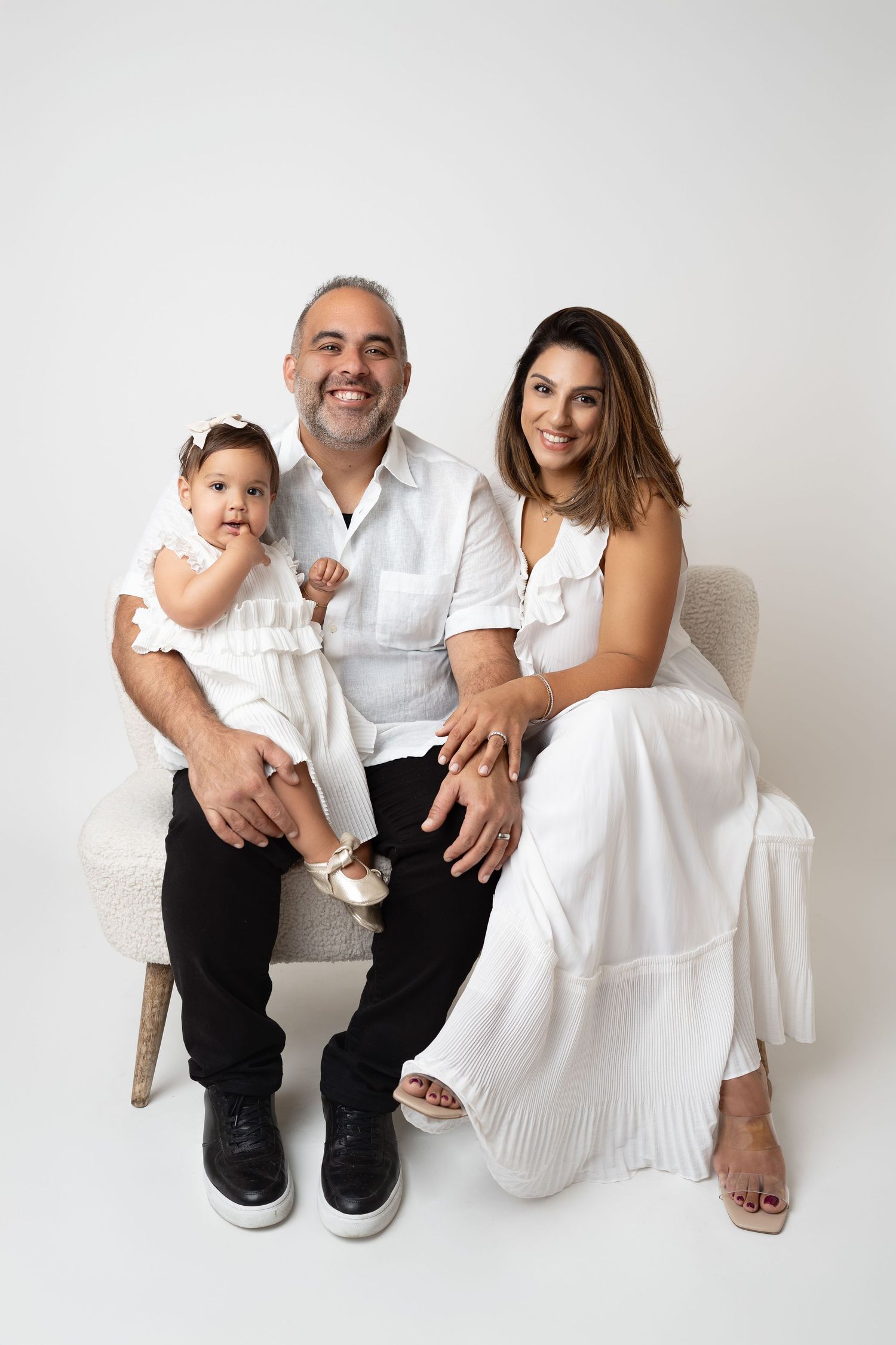 family on white backdrop. Best maternity and newborn photographers in Los Angeles, serving Woodland Hills.
