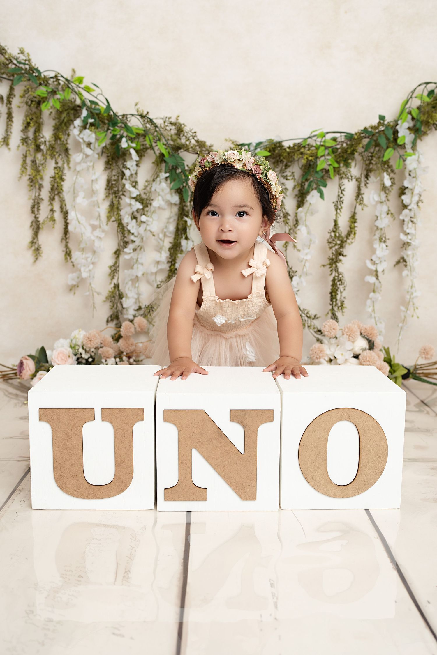 baby standing on UNO blocks in our Woodland Hills studio. Amazing milestone photography in Los Angeles & the SF Valley.