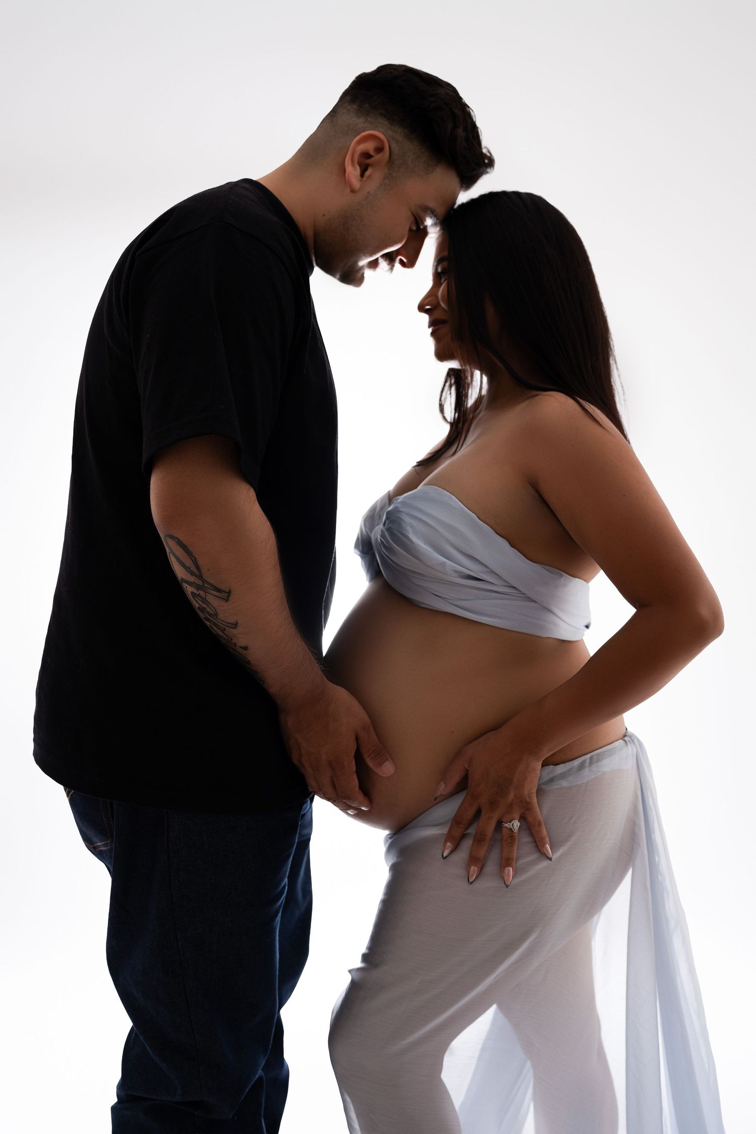 Pregnant mom with partner at our Woodland Hills studio. The best maternity photographer in Los Angeles.