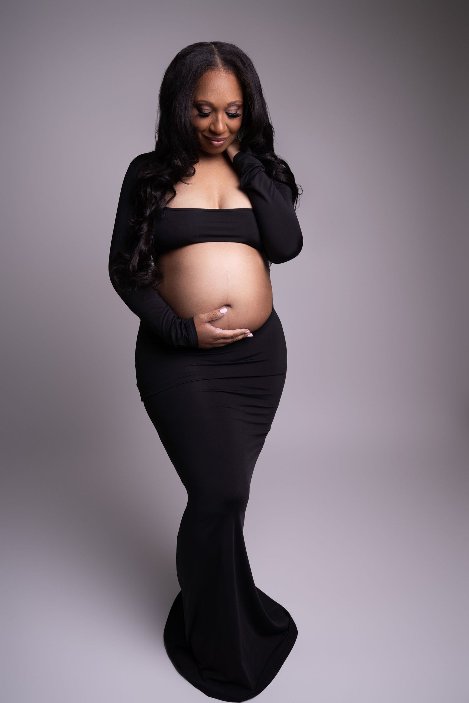 Pregnant mom in gown, at our Woodland Hills studio. The best maternity photographer in Los Angeles.