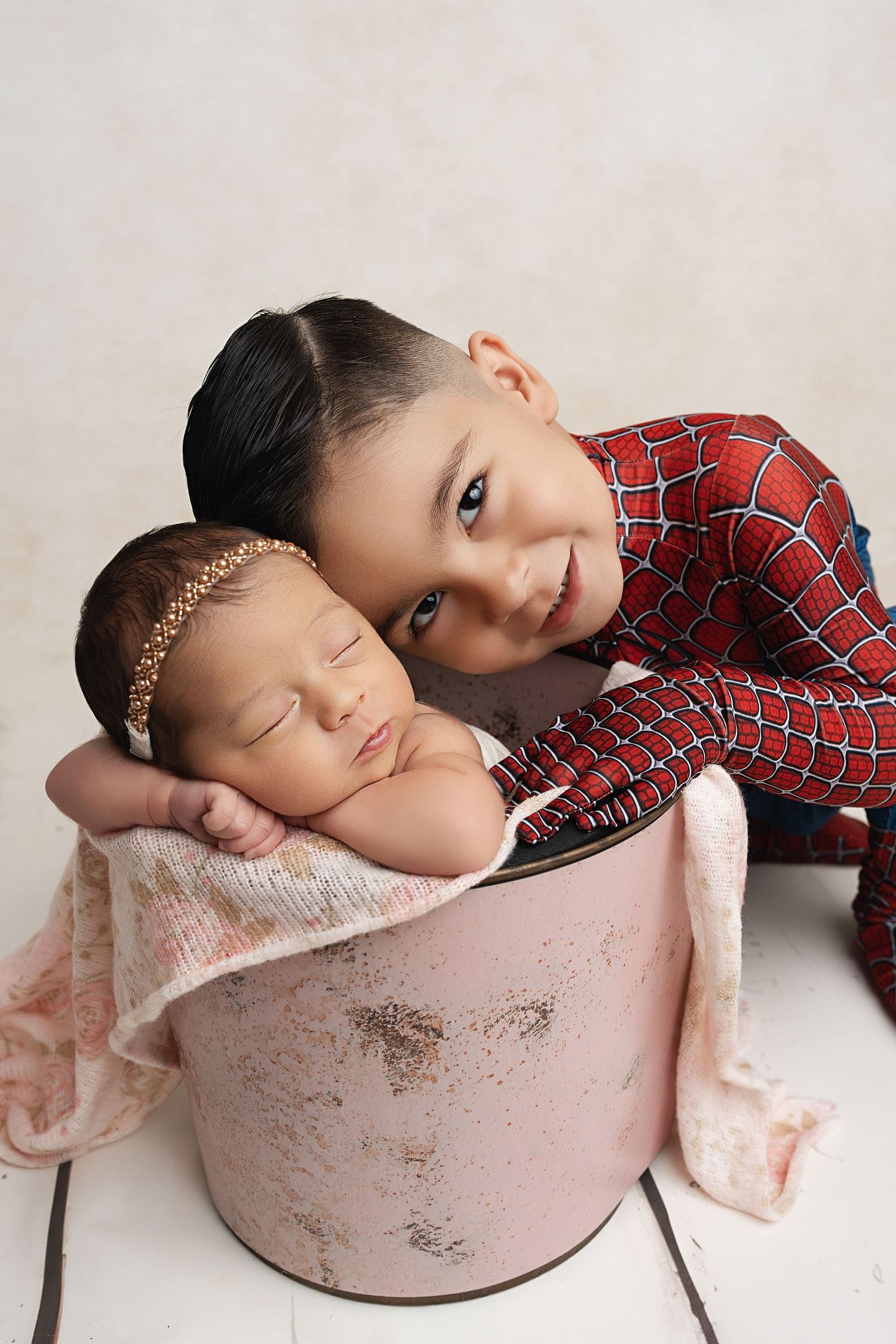 spider-man and newborn. Captured by a sought-after professional newborn photographer in Woodland Hills, Los Angeles.