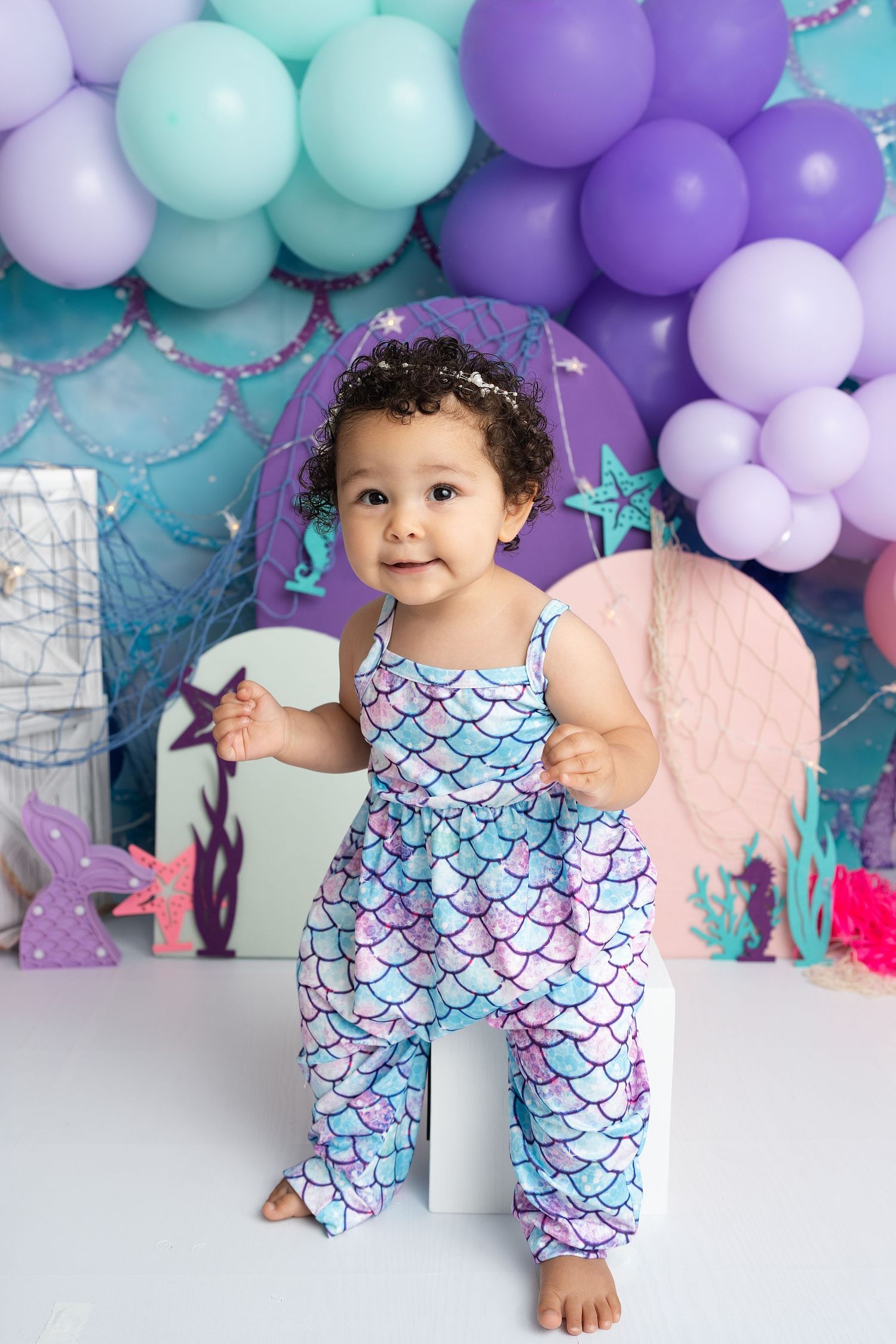 baby standing in our Woodland Hills studio. Amazing milestone photography in Los Angeles & the SF Valley.