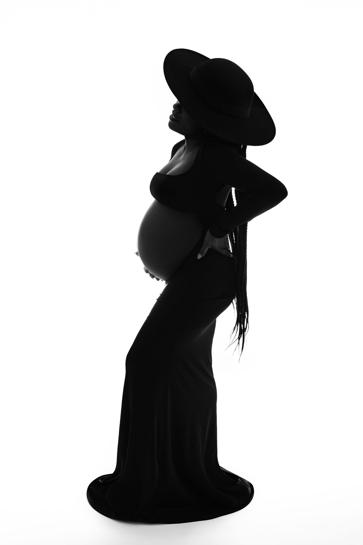 Pregnant mom in gown at our Woodland Hills studio. The best maternity photographer in Los Angeles.
