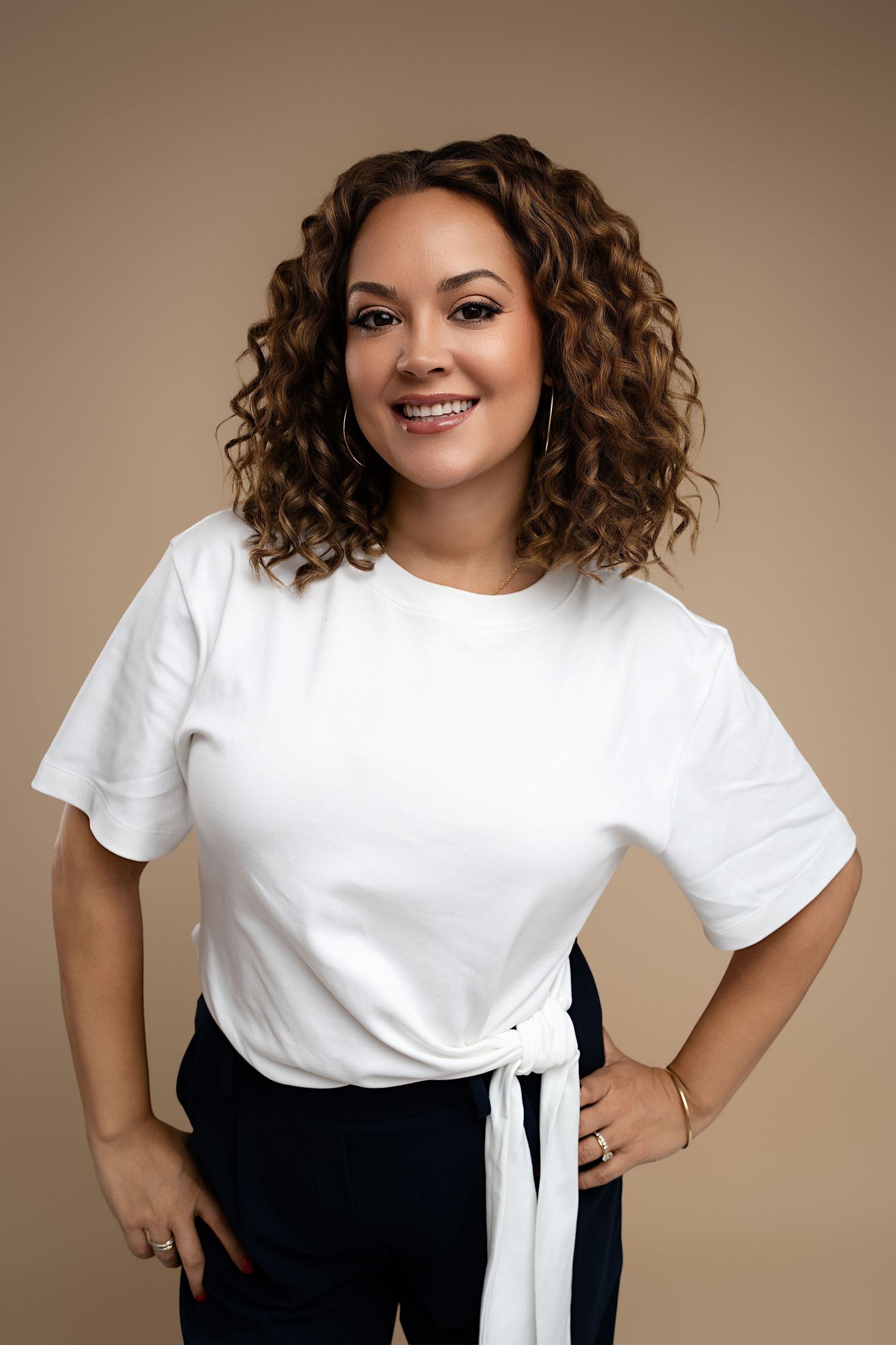 woman on a white backdrop. Best maternity and newborn photographers in Los Angeles, serving Woodland Hills.