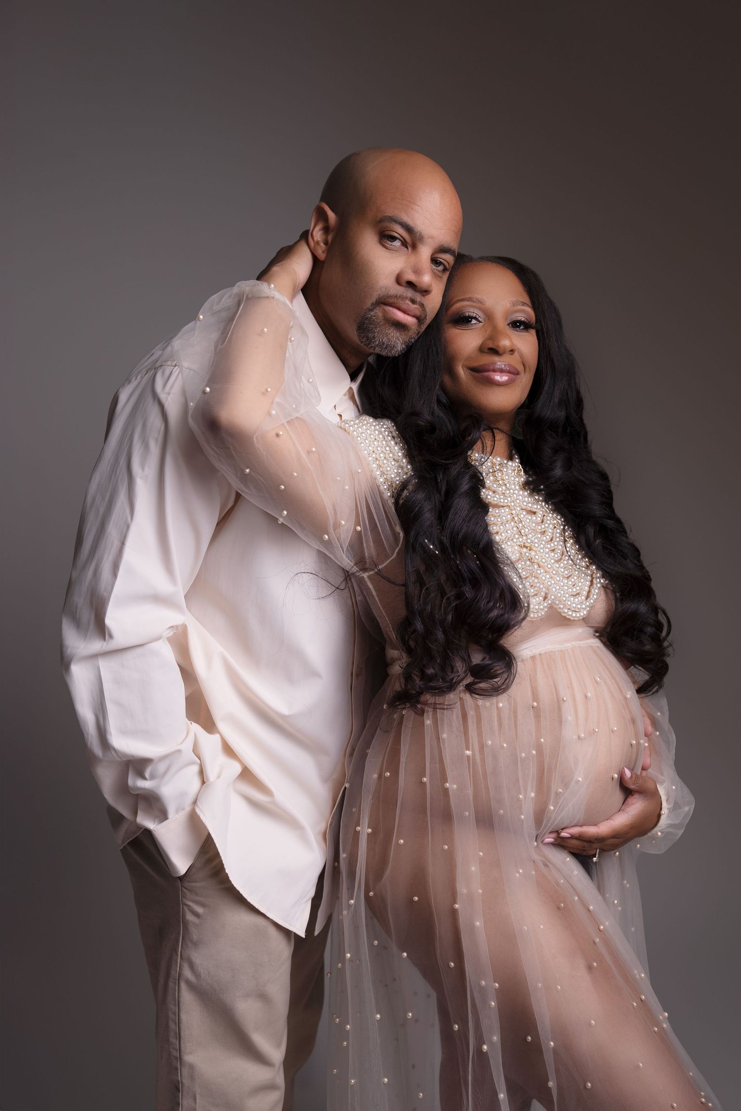 Pregnant mom with partner, at our Woodland Hills studio. The best maternity photographer in Los Angeles.