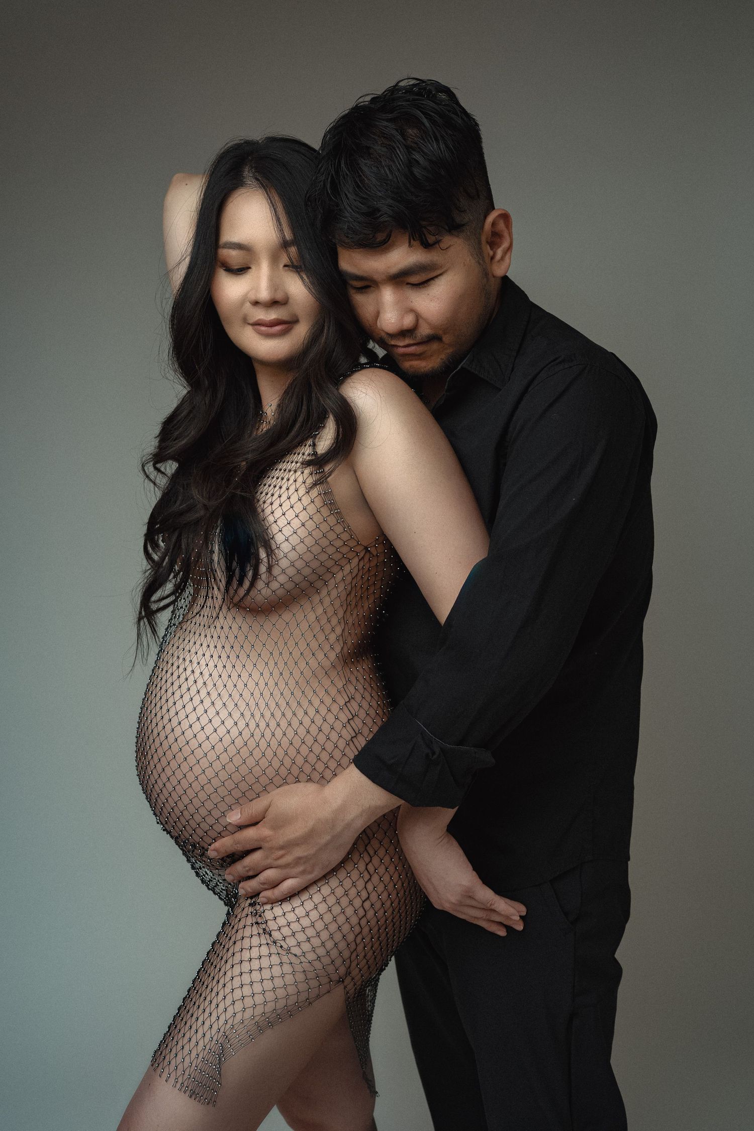 Pregnant mom with partner at our Woodland Hills studio. The best maternity photographer in Los Angeles.