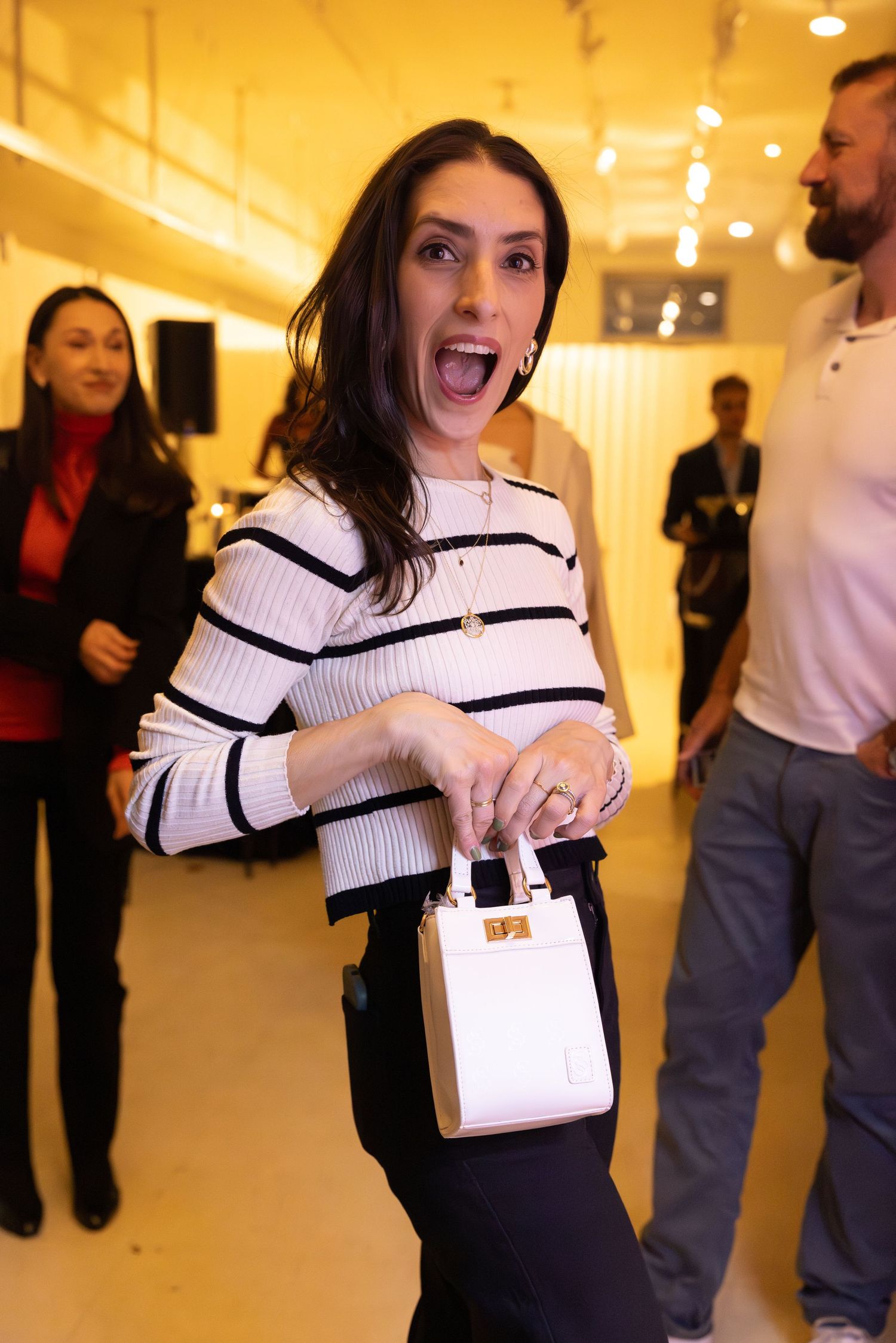 Guest arriving at a Flying Solo fashion event in New York City.