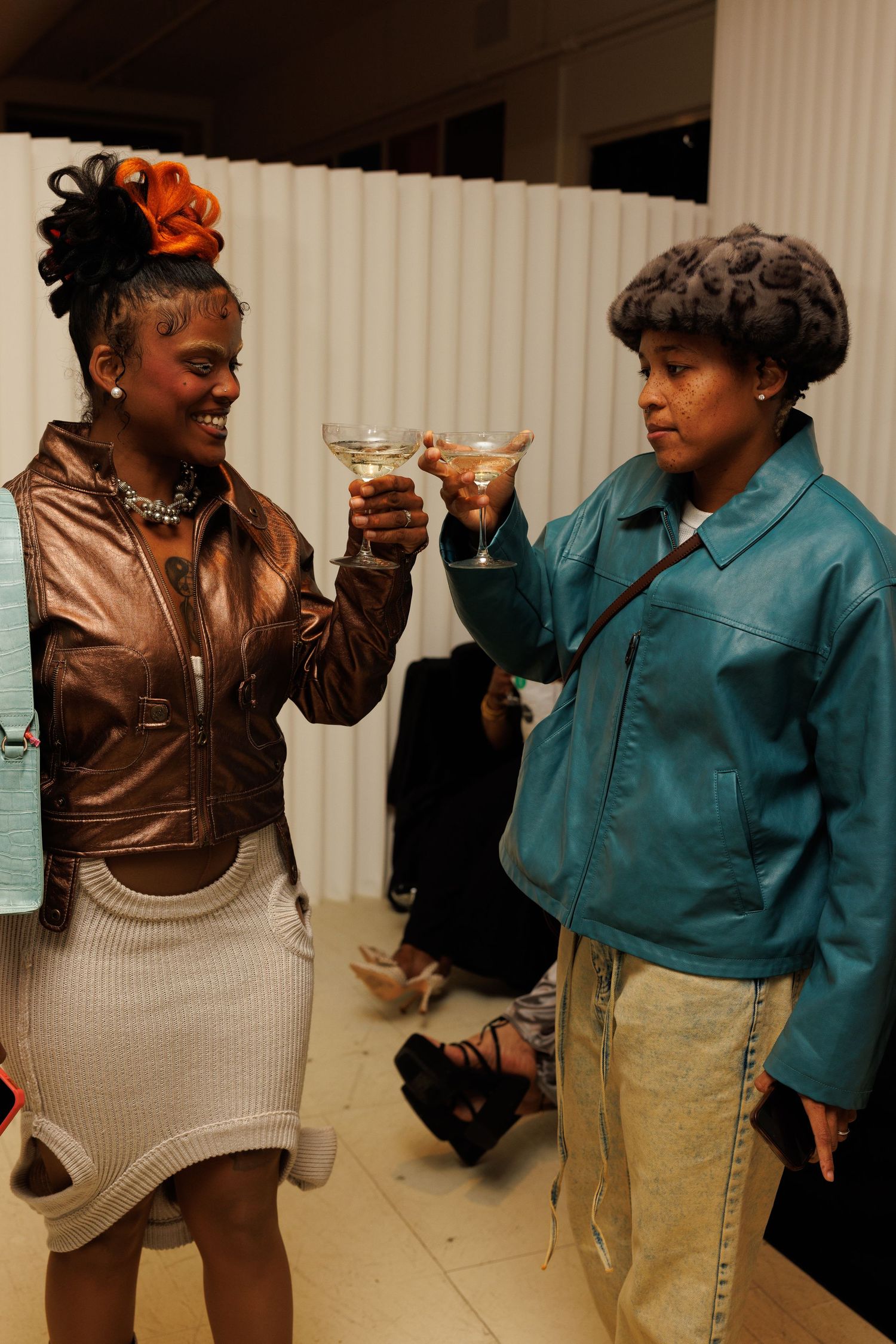 Guests networking during a Flying Solo fashion event in New York City.