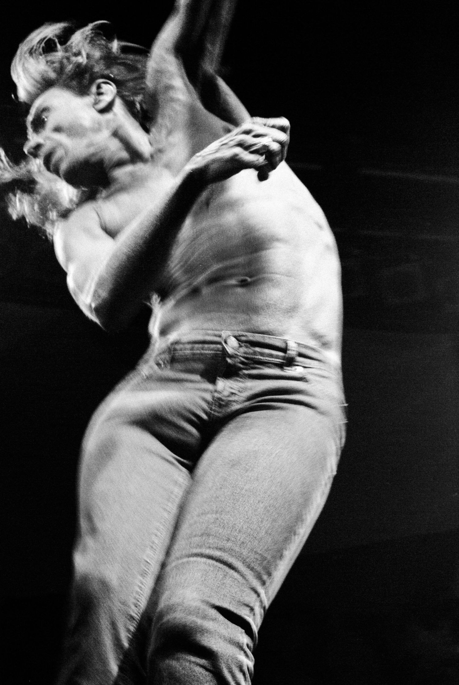 Iggy Pop performing live on stage in Toronto in 2003, photographed by Lisa Mark.
