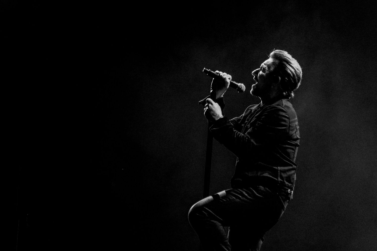 Bono performing live with U2 in Toronto, photographed by Canadian concert photographer Lisa Mark.
