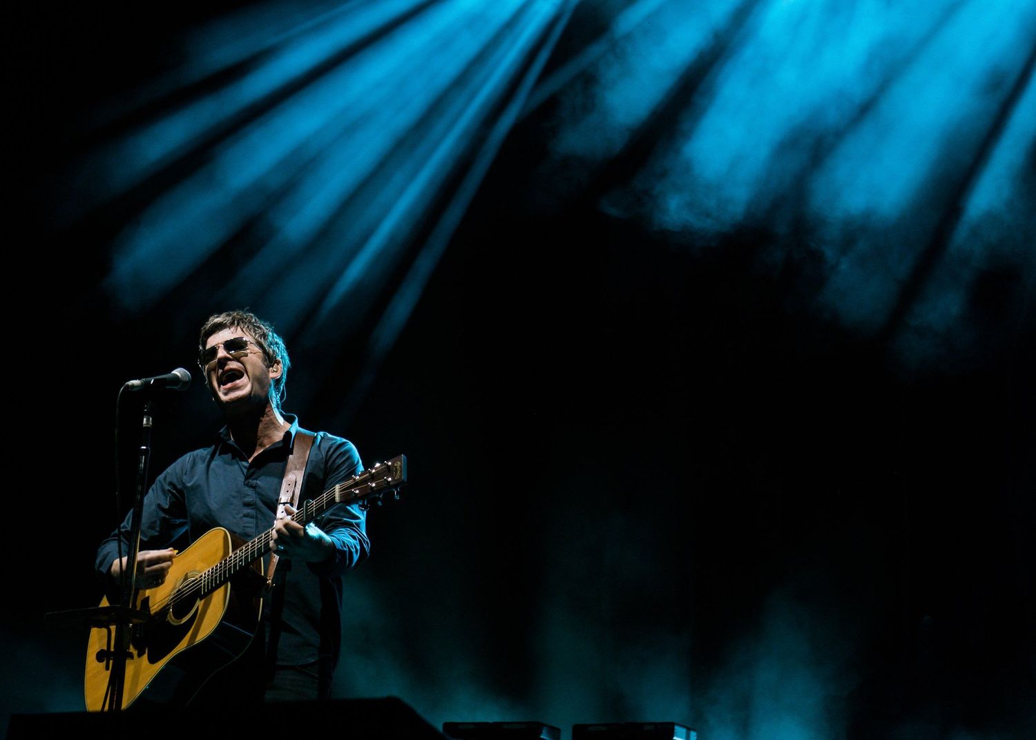 Noel Gallagher performing live at Echo Beach in Toronto, photographed by Lisa Mark.