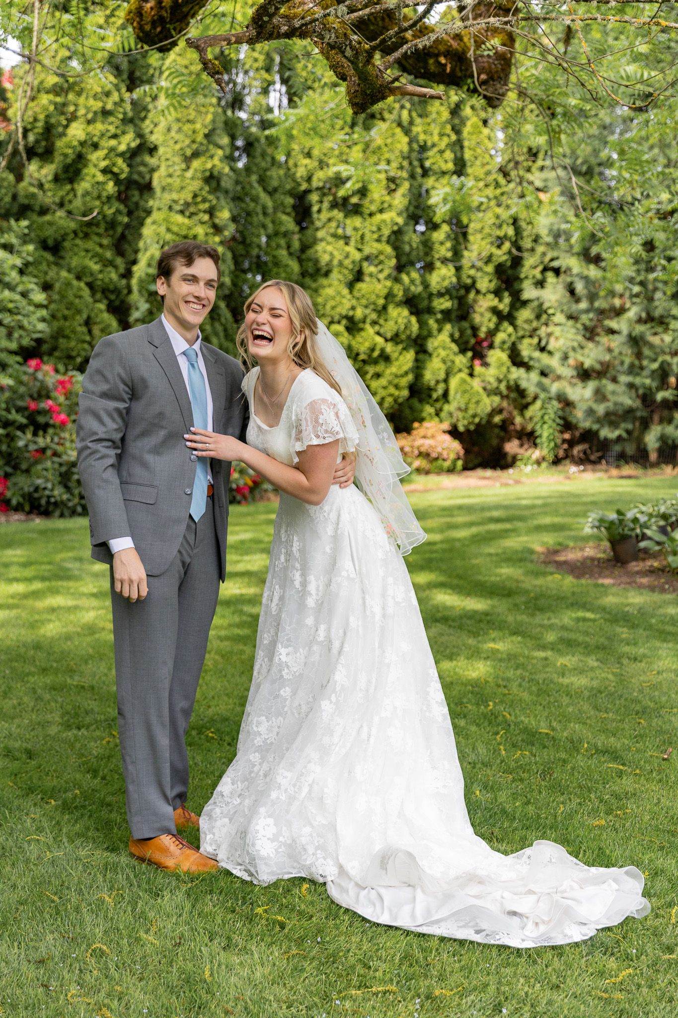 Bride Laughing with Groom at Ogren Gardens In Eugene, Oregon captured by Oregon Wedding Photographer