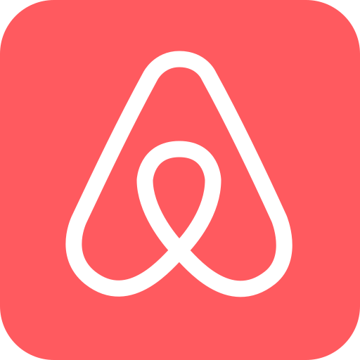 Airbnb logo design in coral red color showing the curved Belo symbol and company wordmark on white background.
