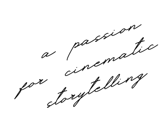 A handwritten note in black ink with cursive text appears on a light surface.