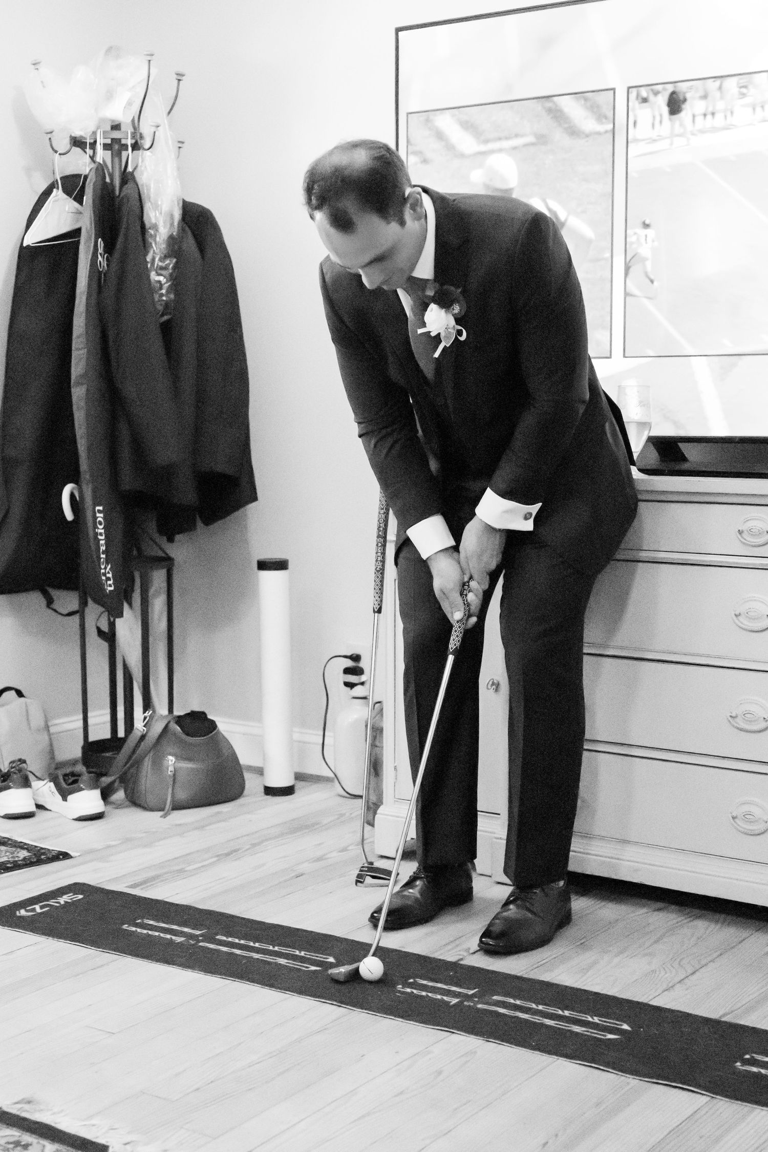 Series of photos showing someone practicing golf putting form on an indoor office floor.