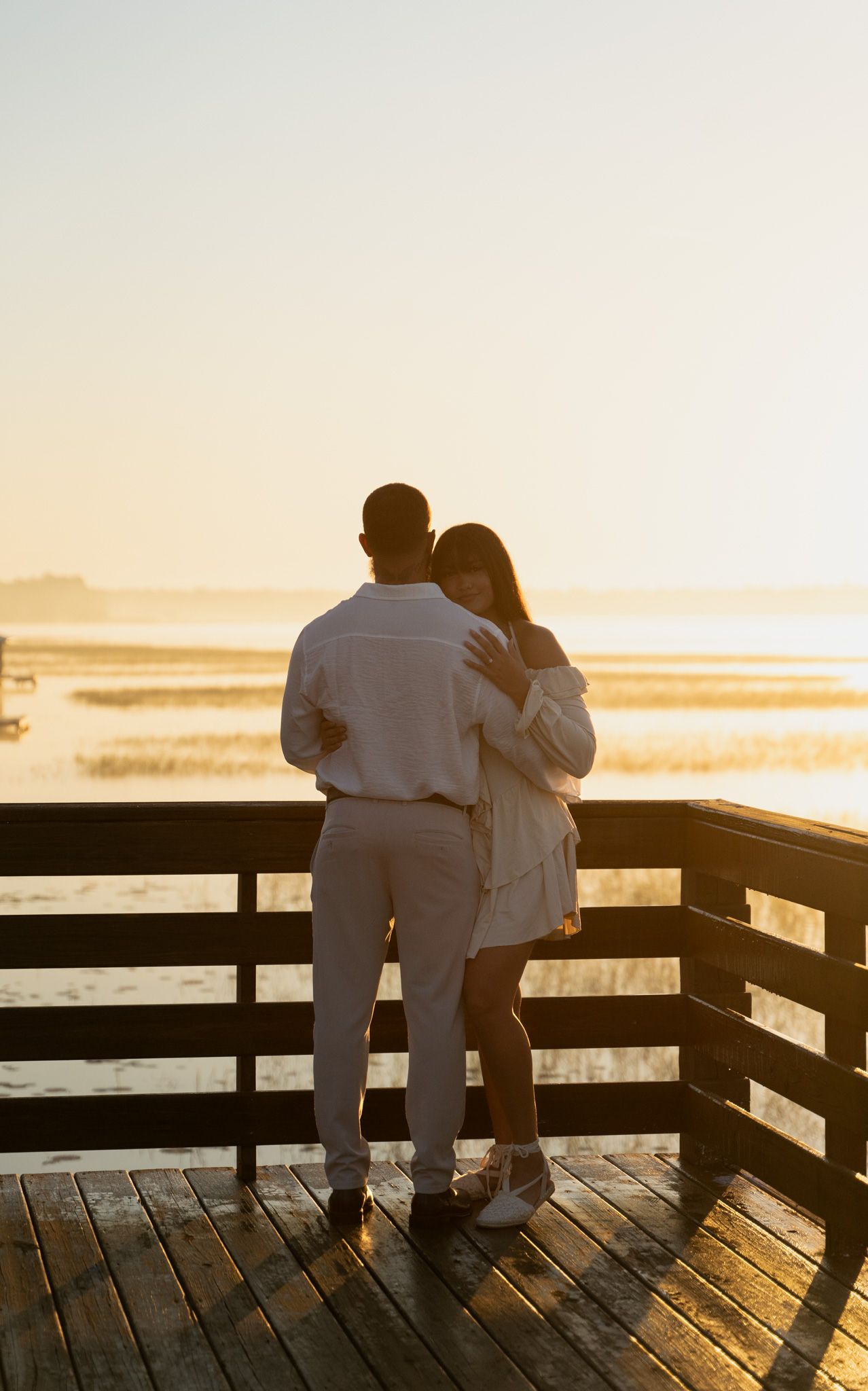 engagement photo shoot on a dock