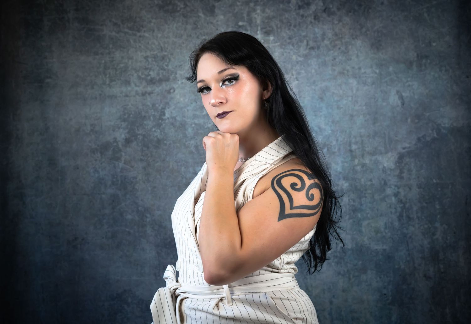 Dramatic portrait series against textured grey background with artistic lighting.