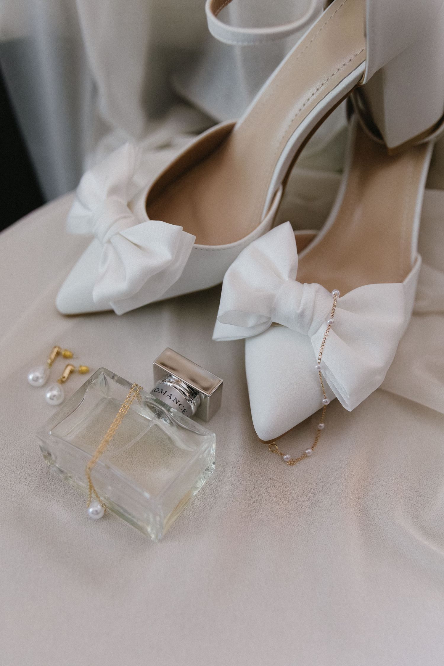 Bridal detail photo of shoes and perfume at Whitehead Manor Charlotte North Carolina wedding photography